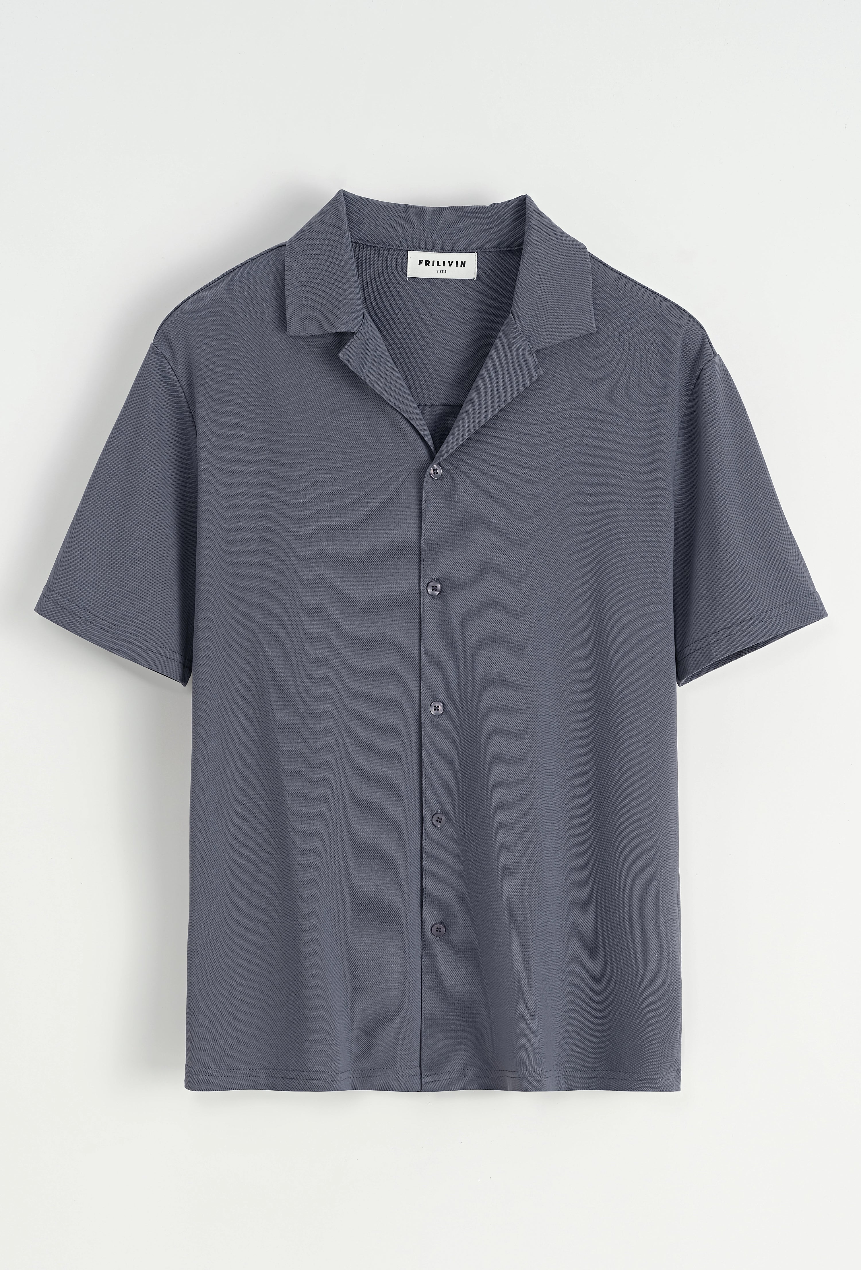 Chemise unie manches courtes