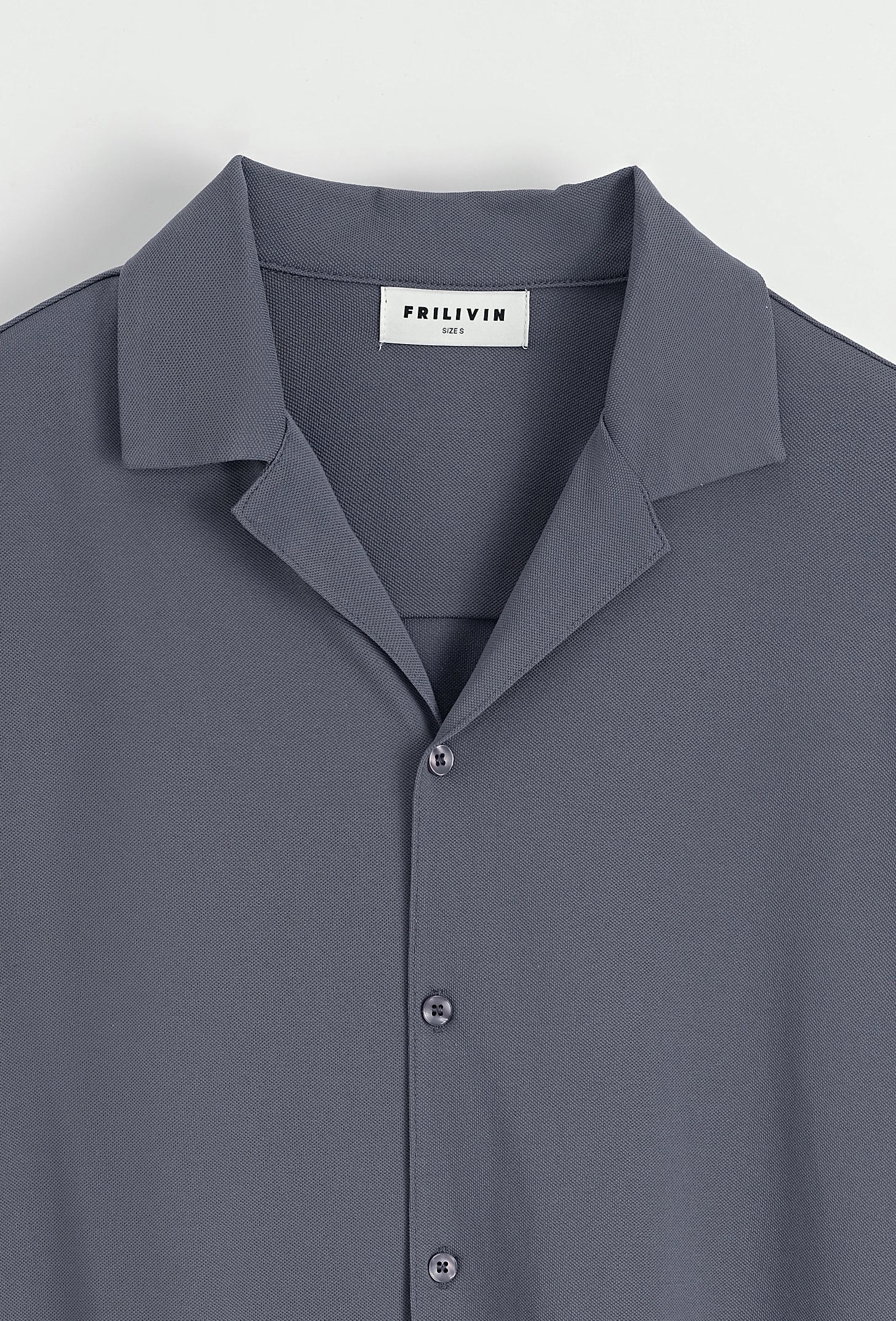 Chemise unie manches courtes