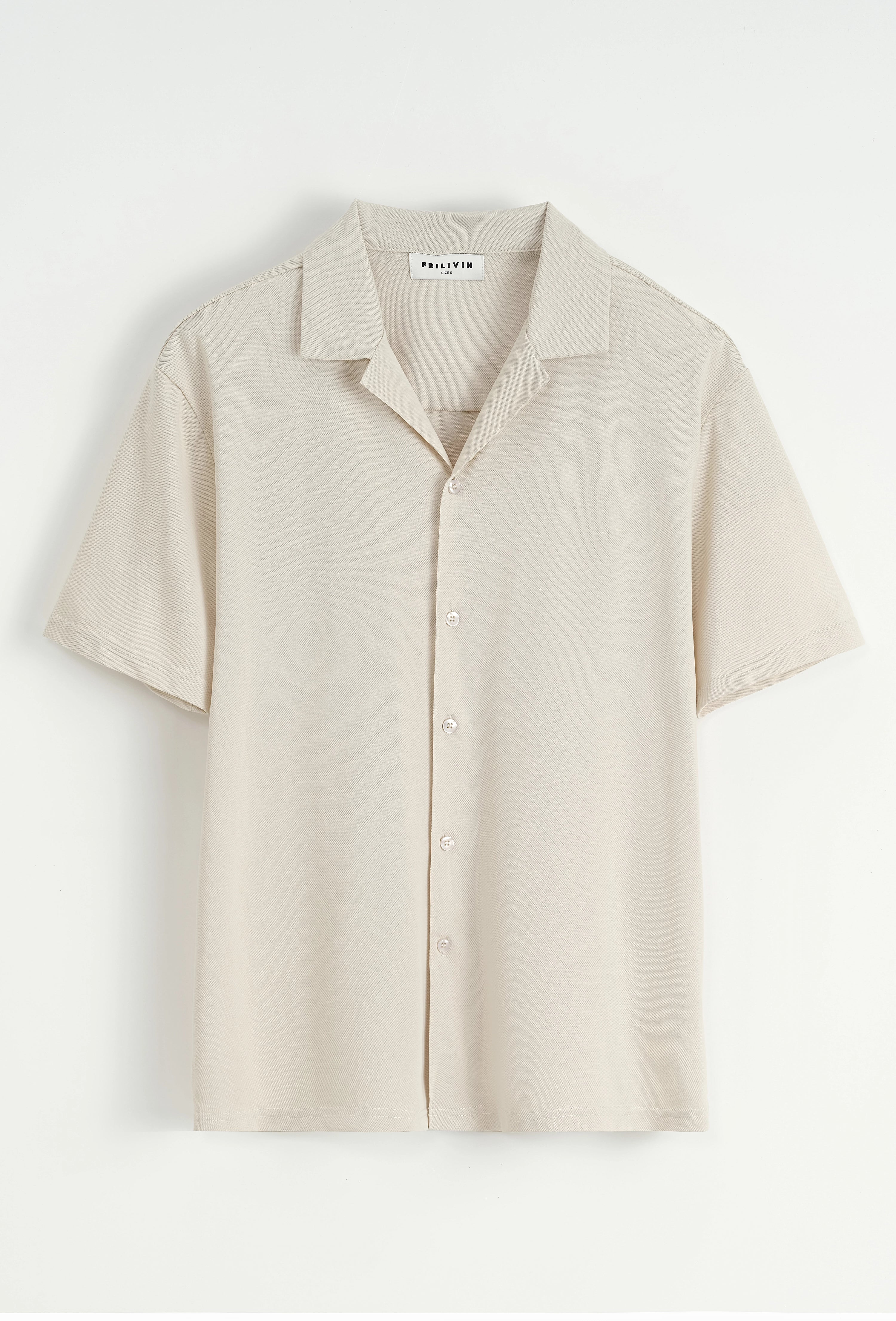 Chemise unie manches courtes