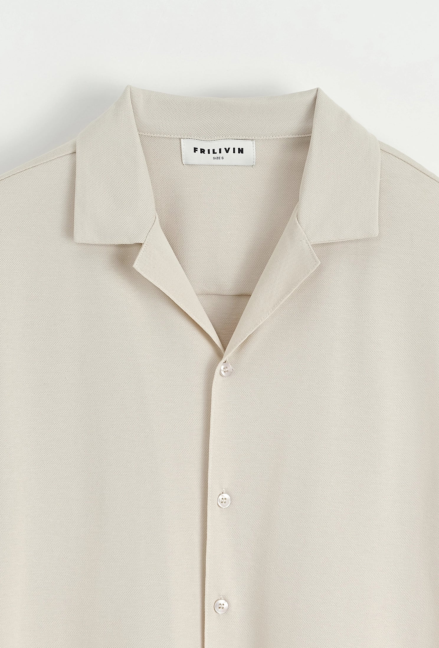 Chemise unie manches courtes