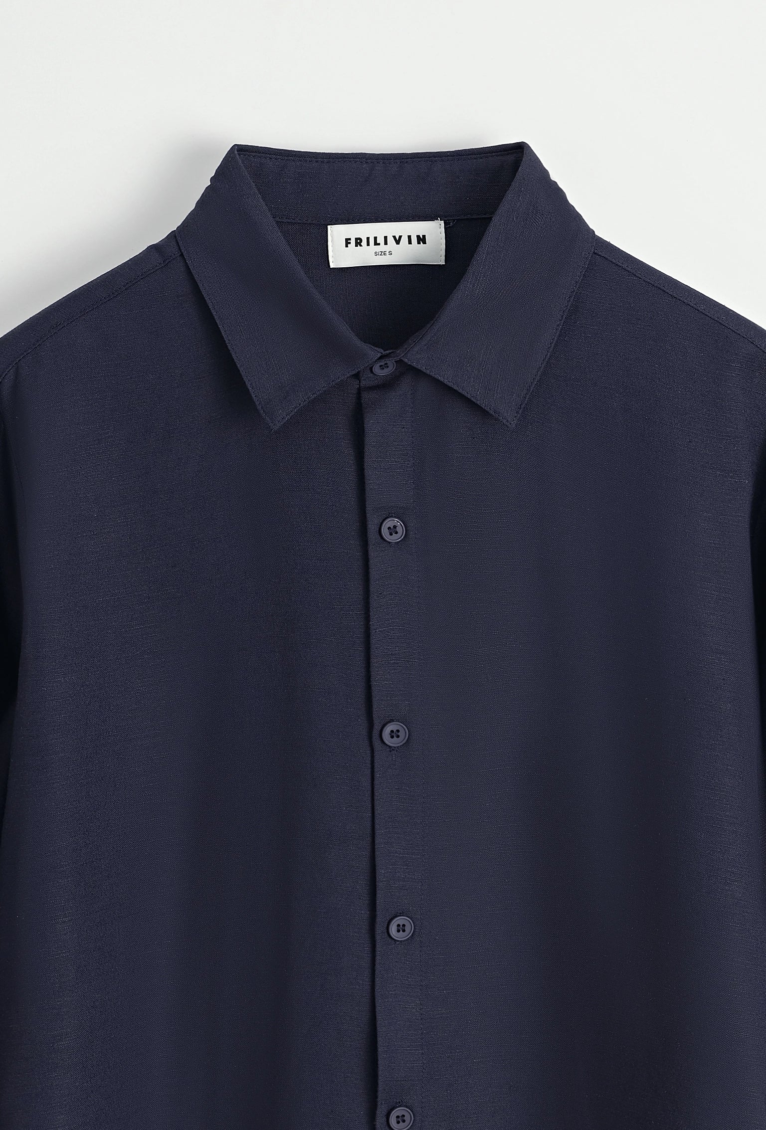 Chemise unie manches longues