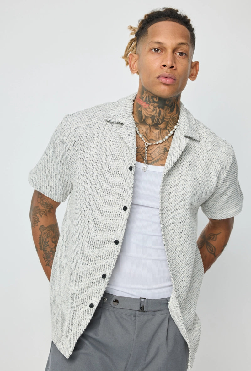 Chemise unie manches courtes