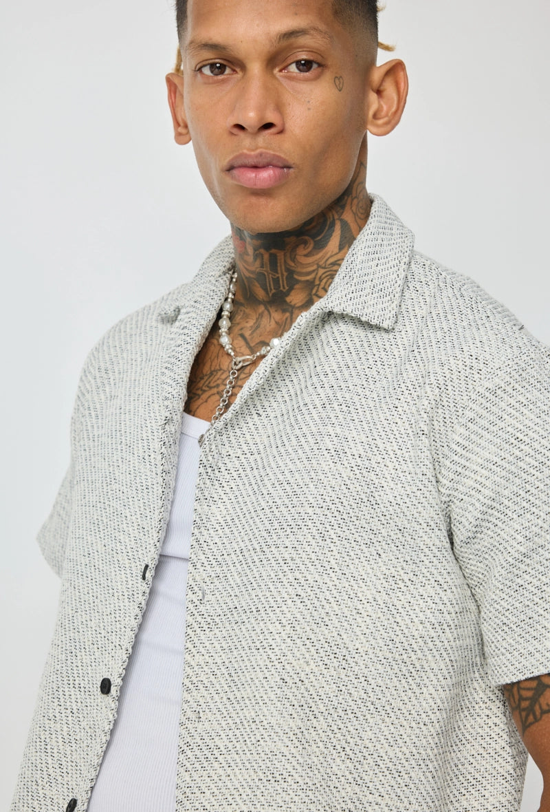 Chemise unie manches courtes