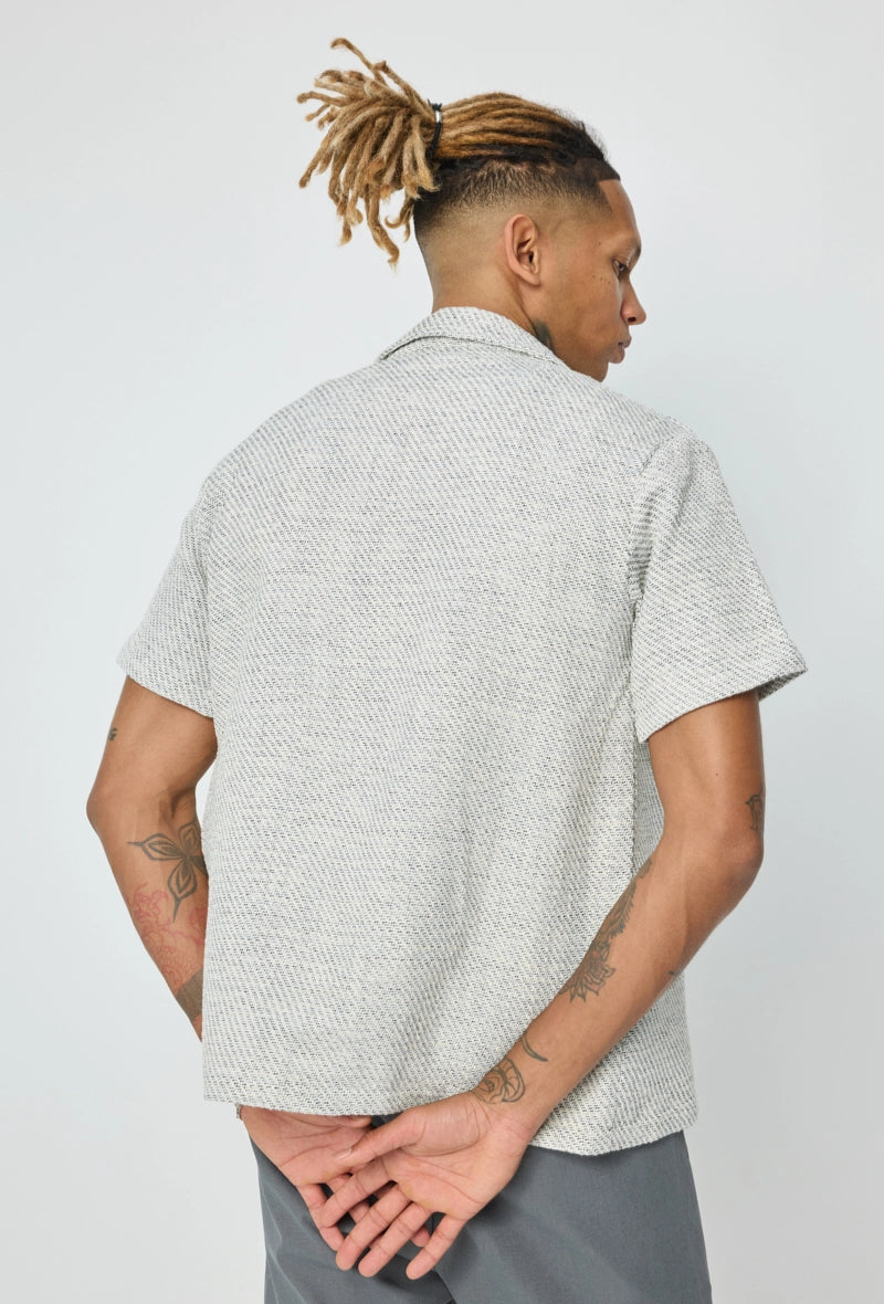 Chemise unie manches courtes