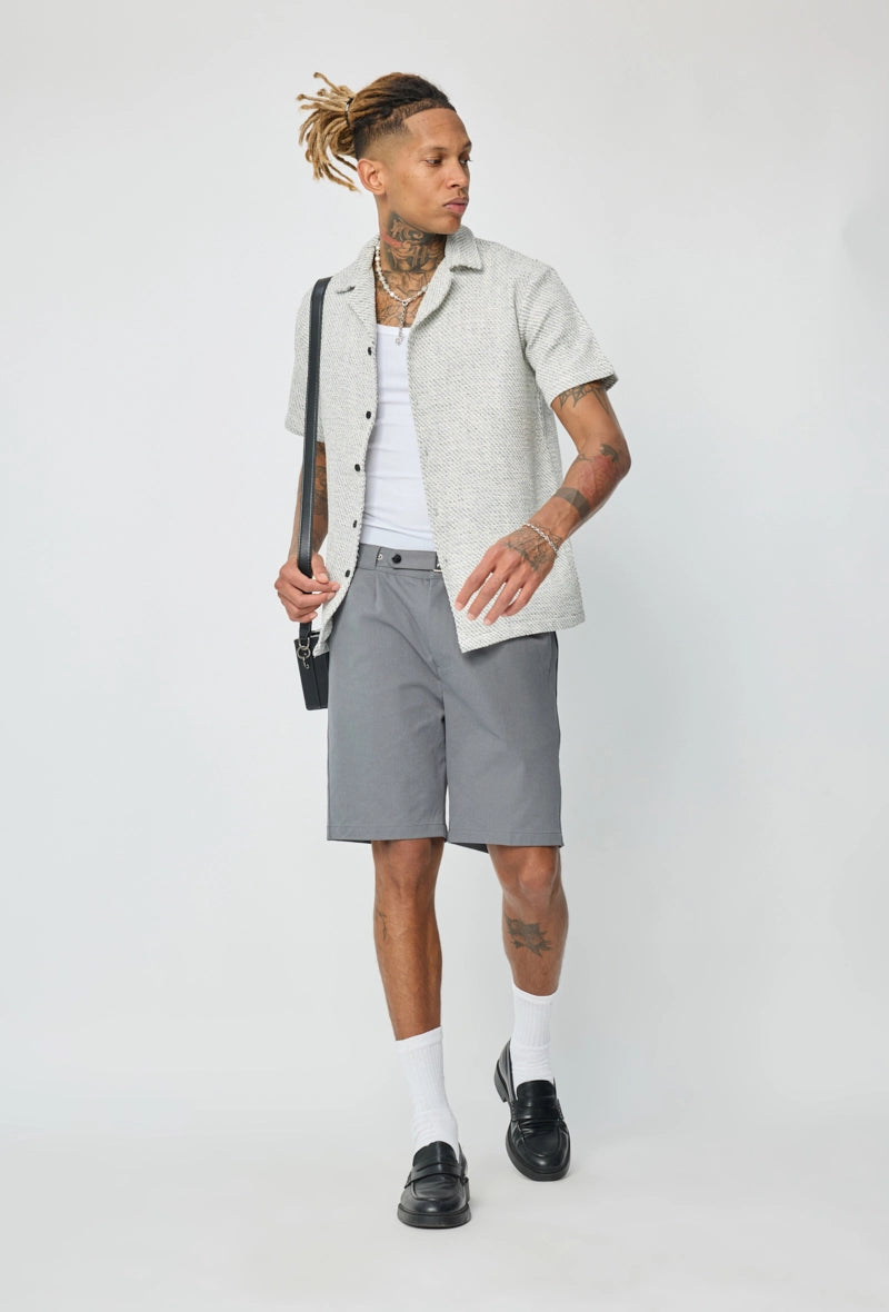 Chemise unie manches courtes