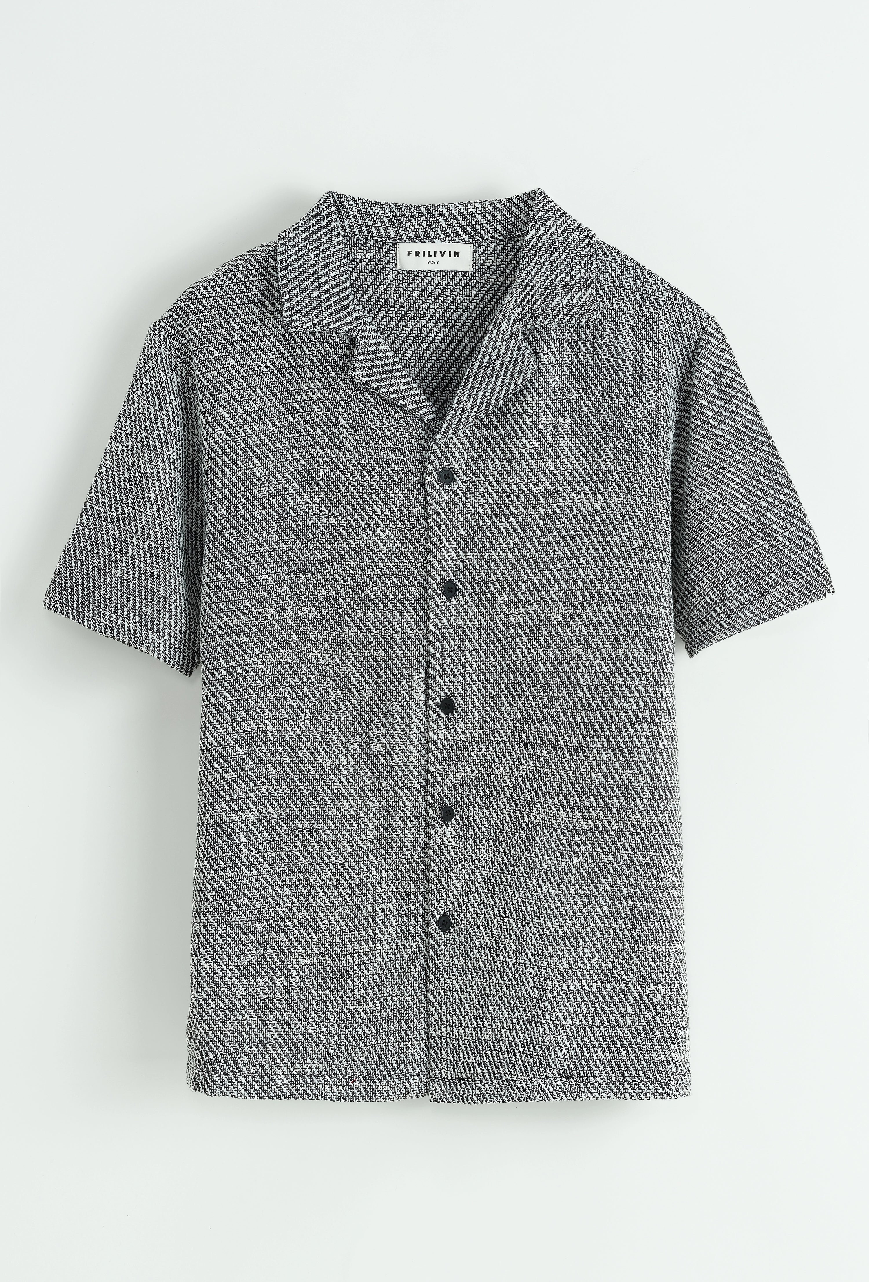 Chemise unie manches courtes