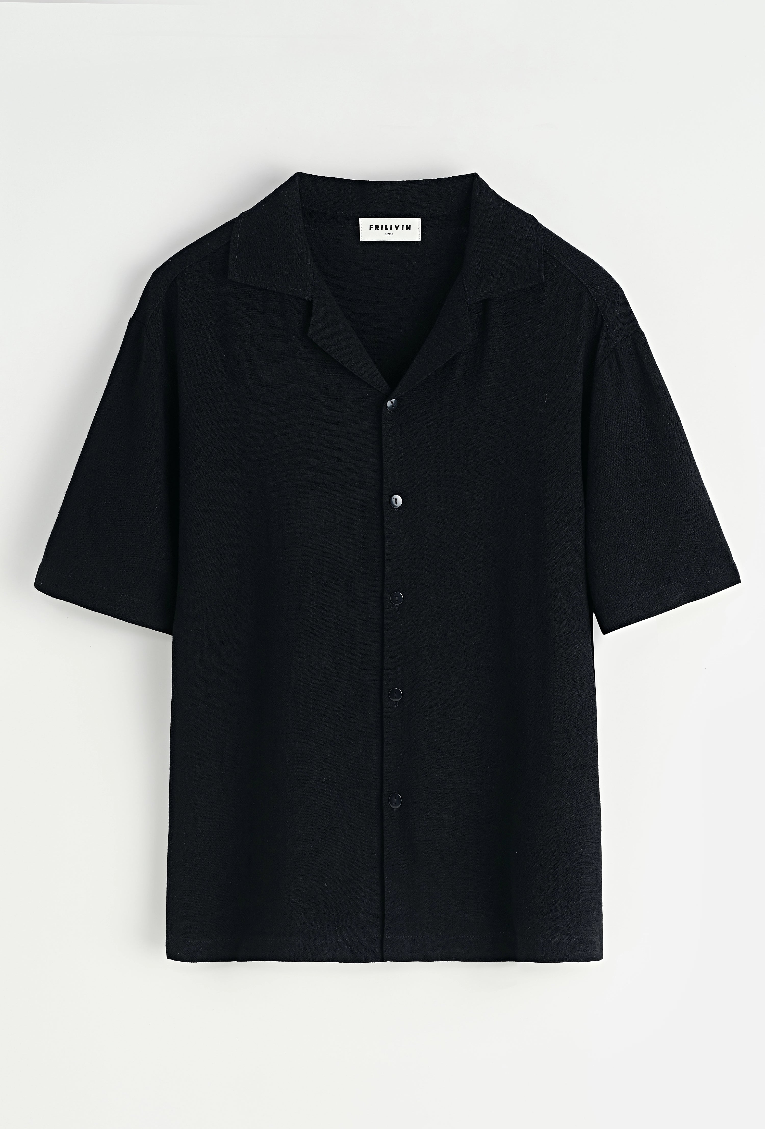 Chemise unie à boutons manches courtes