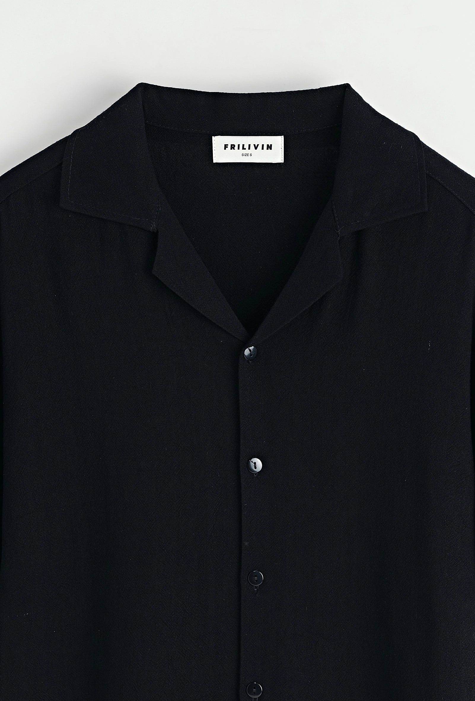 Chemise unie à boutons manches courtes