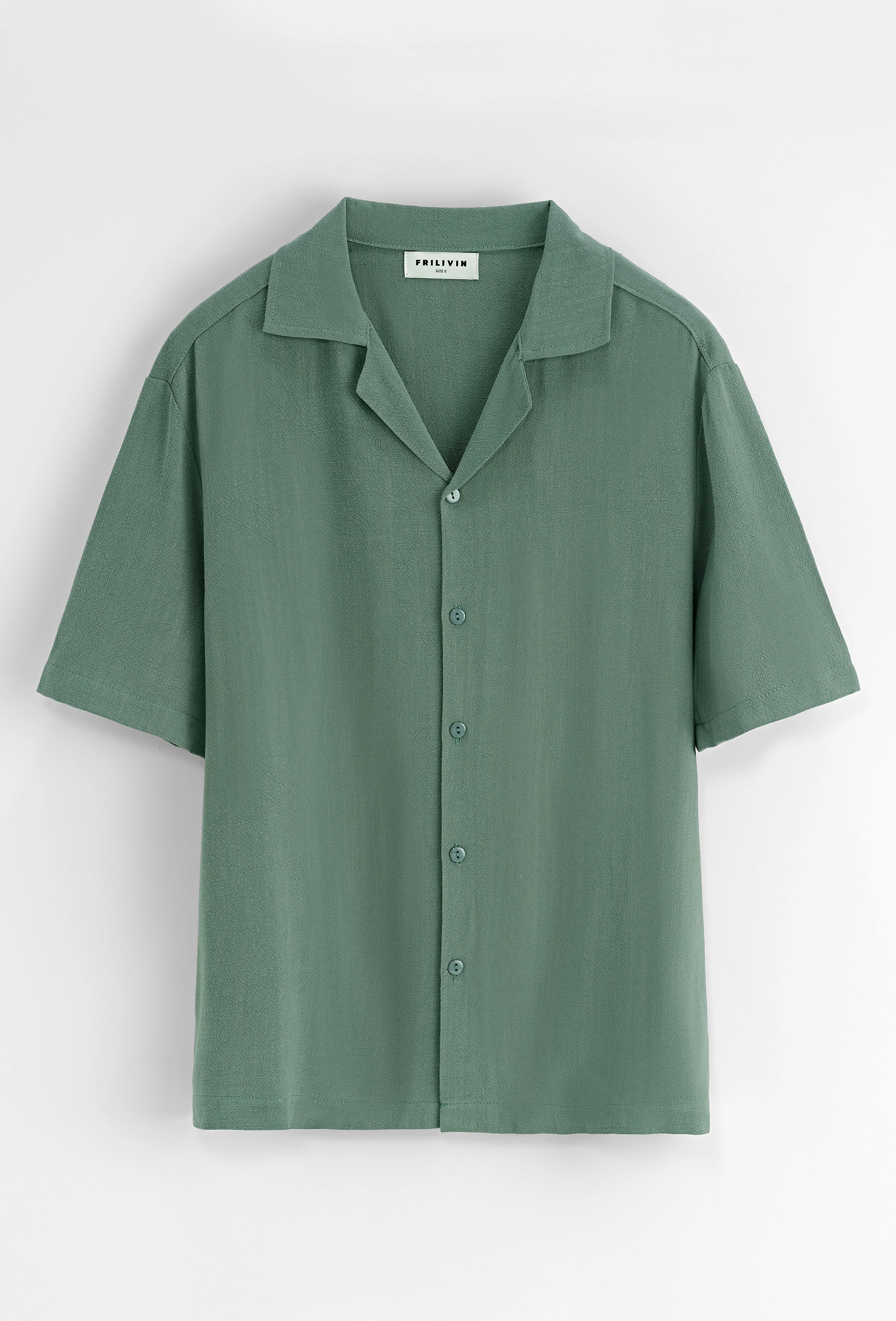 Chemise unie à boutons manches courtes