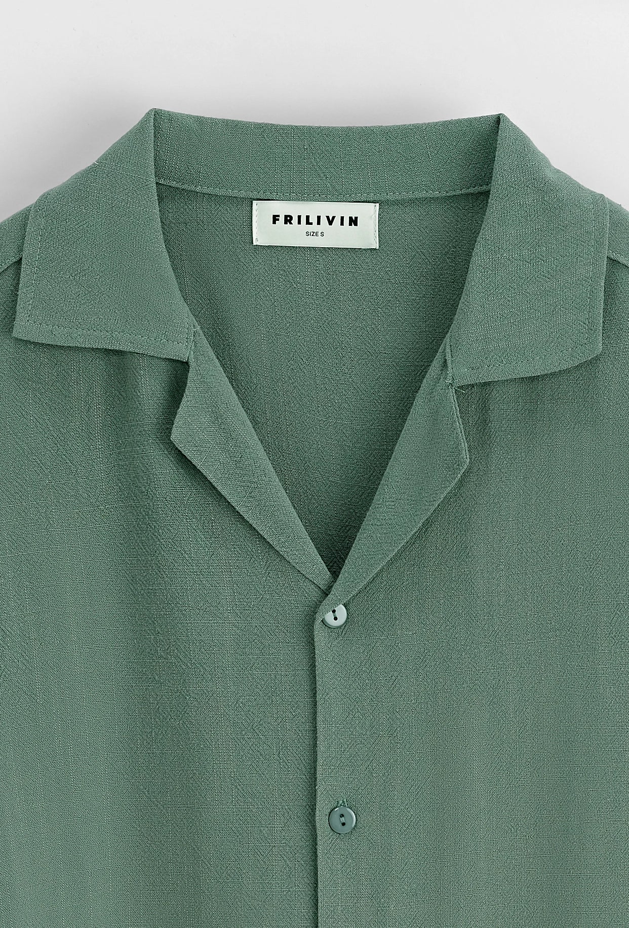 Chemise unie à boutons manches courtes