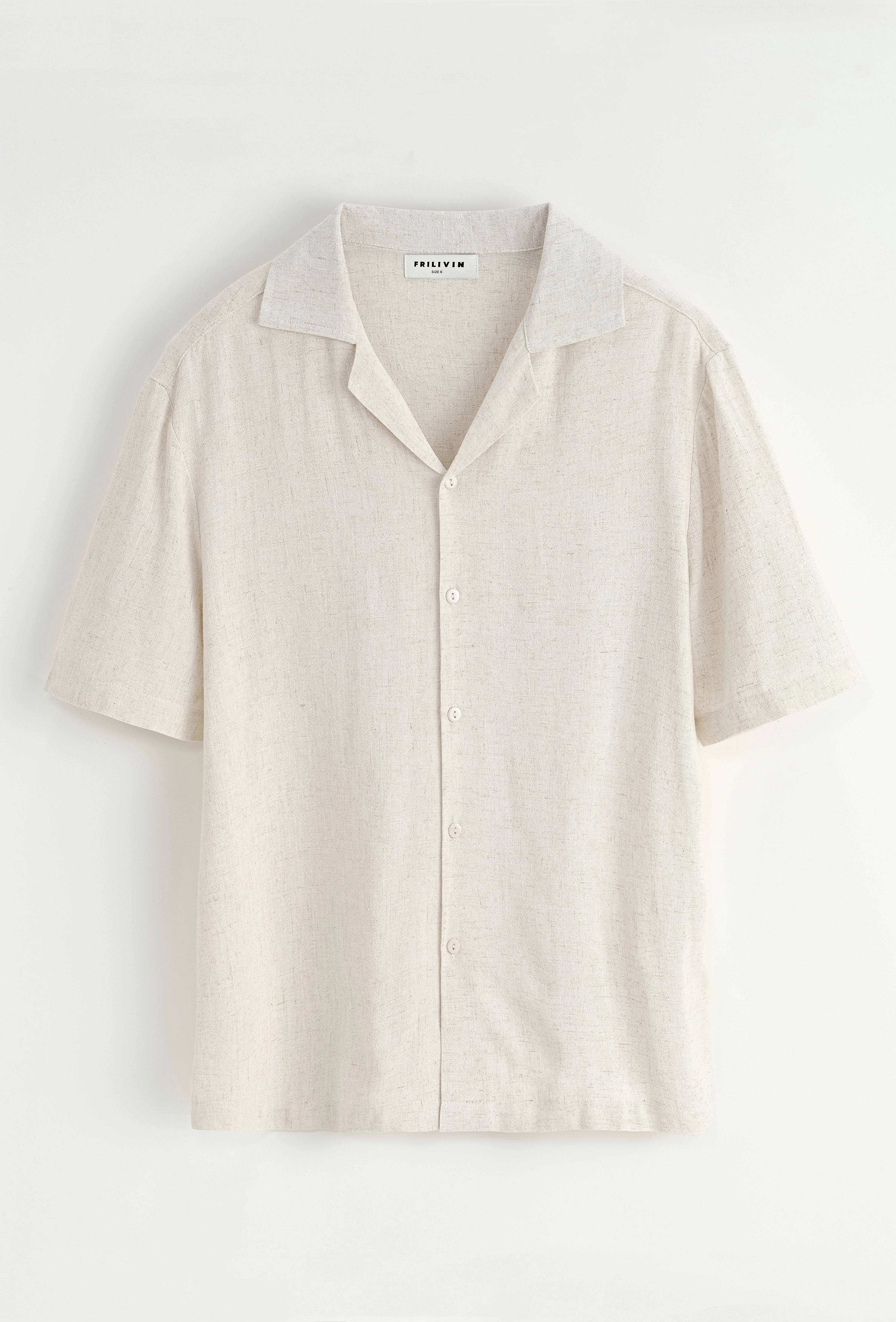 Chemise unie à boutons manches courtes