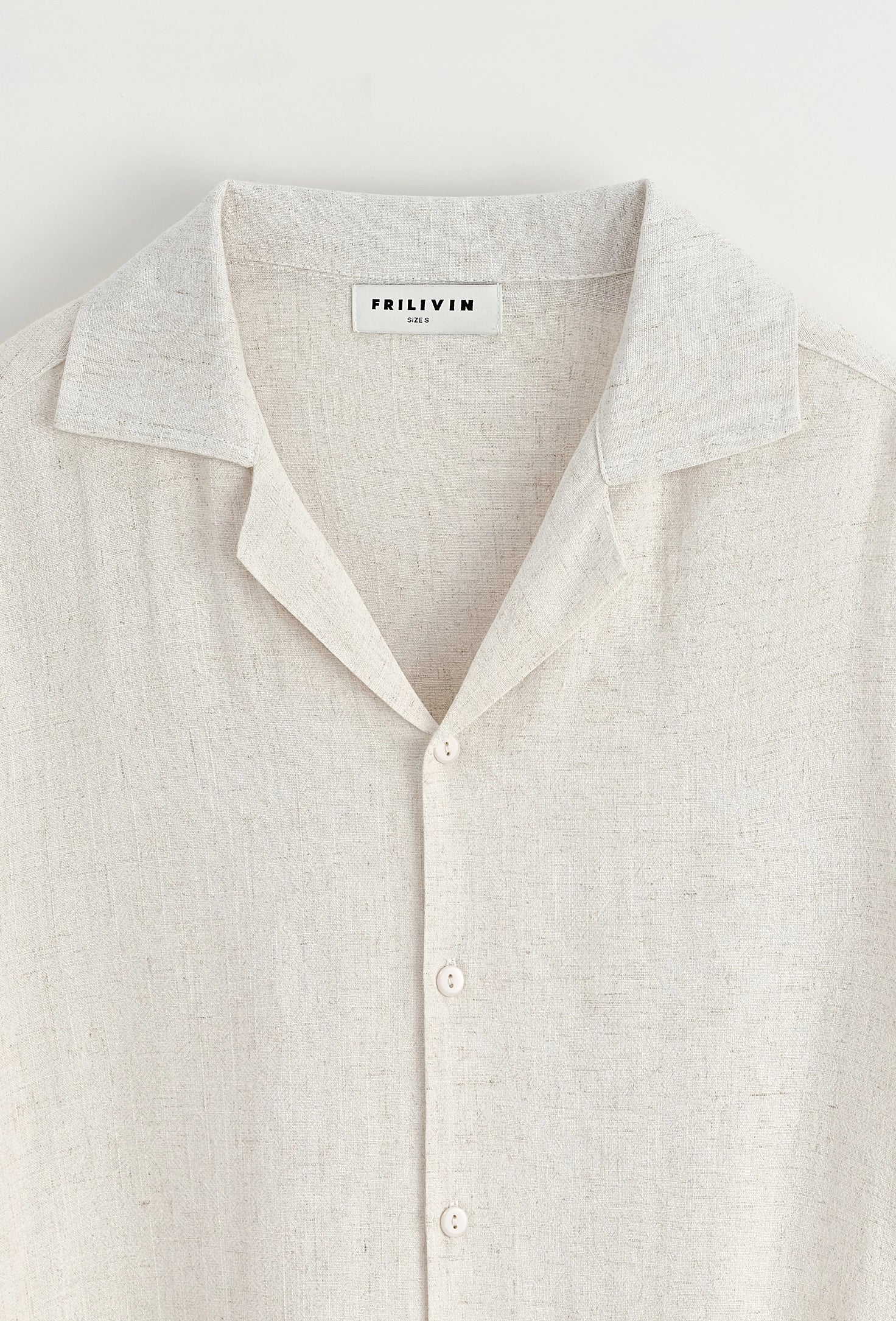 Chemise unie à boutons manches courtes