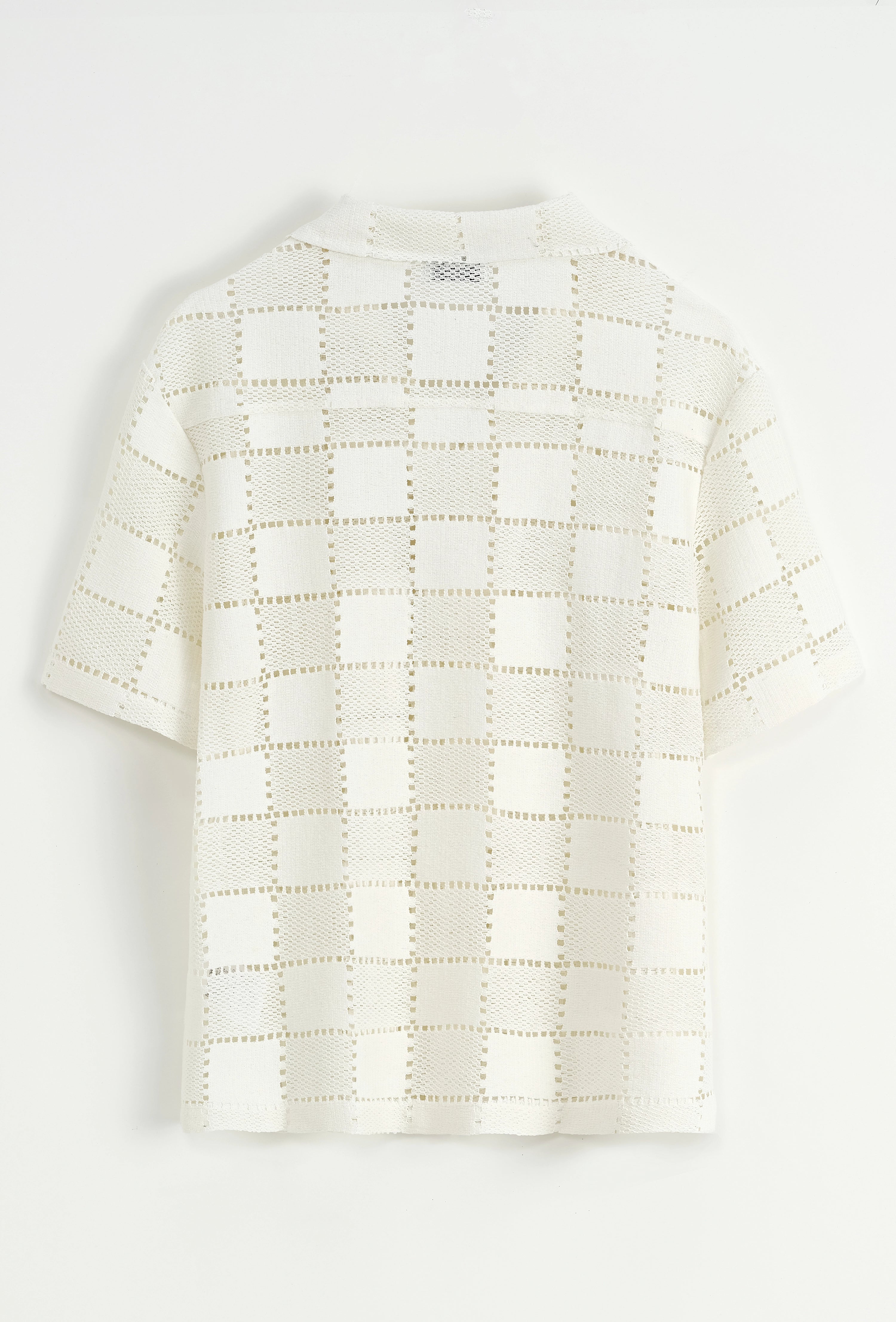 Chemise unie à motif carré