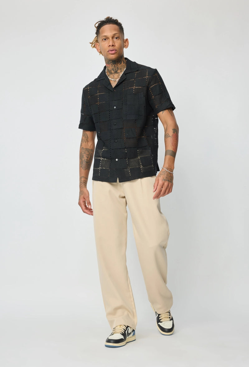 Chemise unie à motif carré