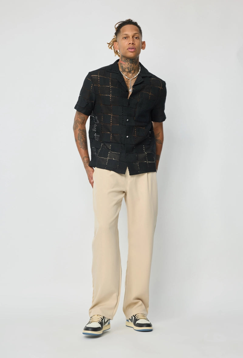 Chemise unie à motif carré