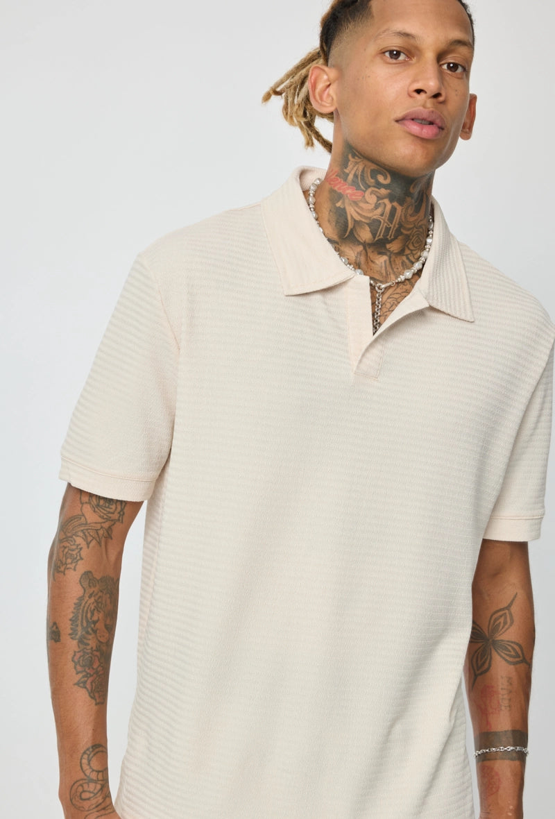 Polo uni à manches courtes