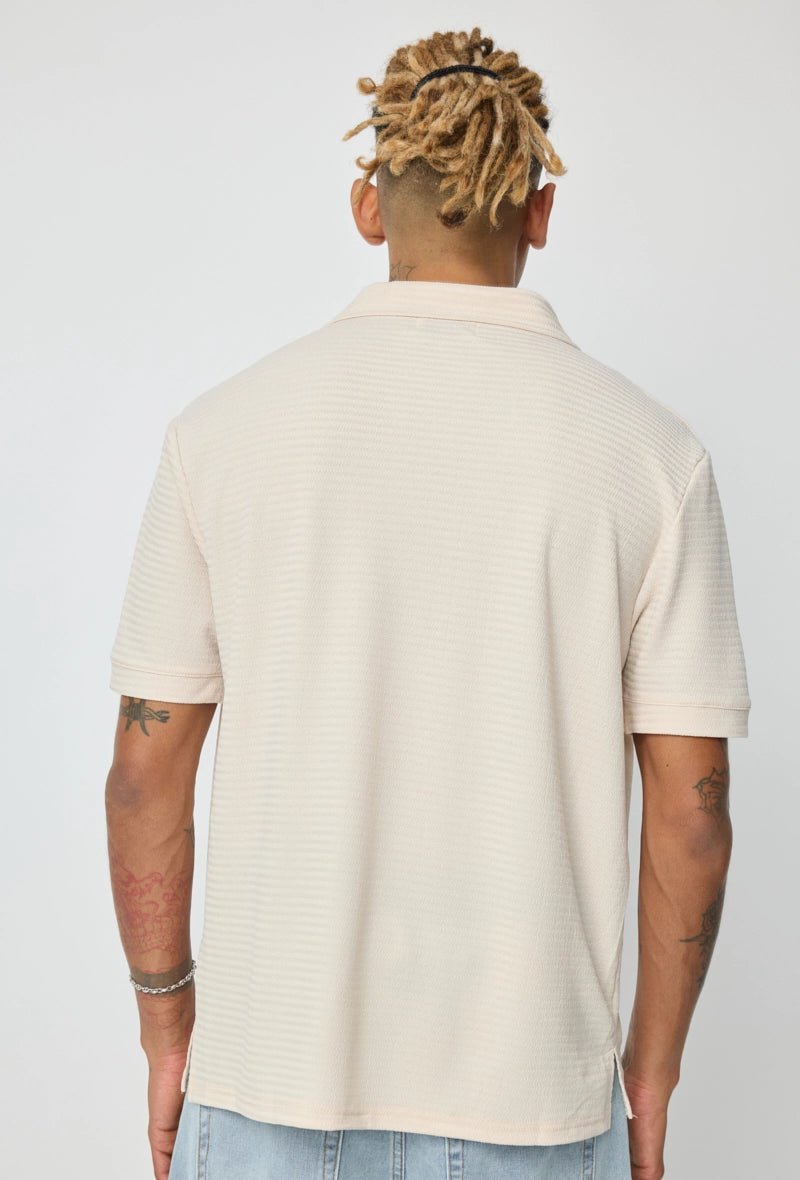 Polo uni à manches courtes