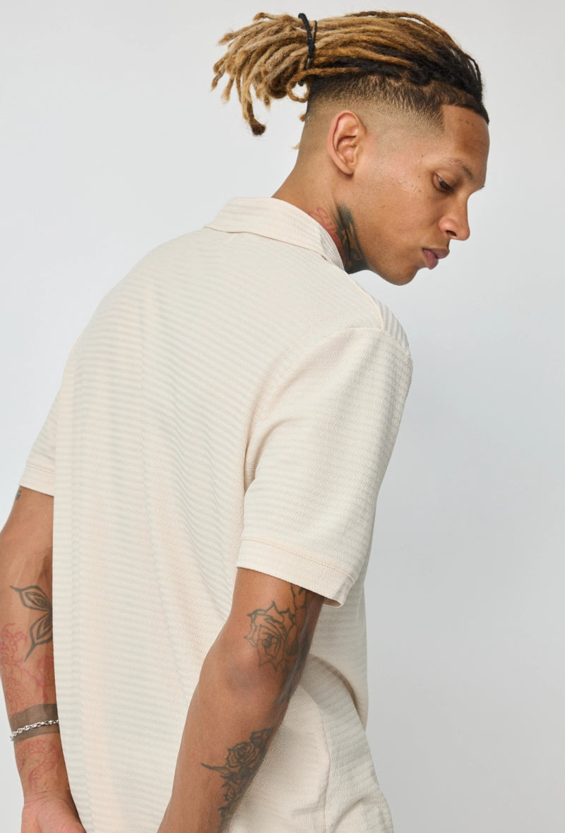 Polo uni à manches courtes