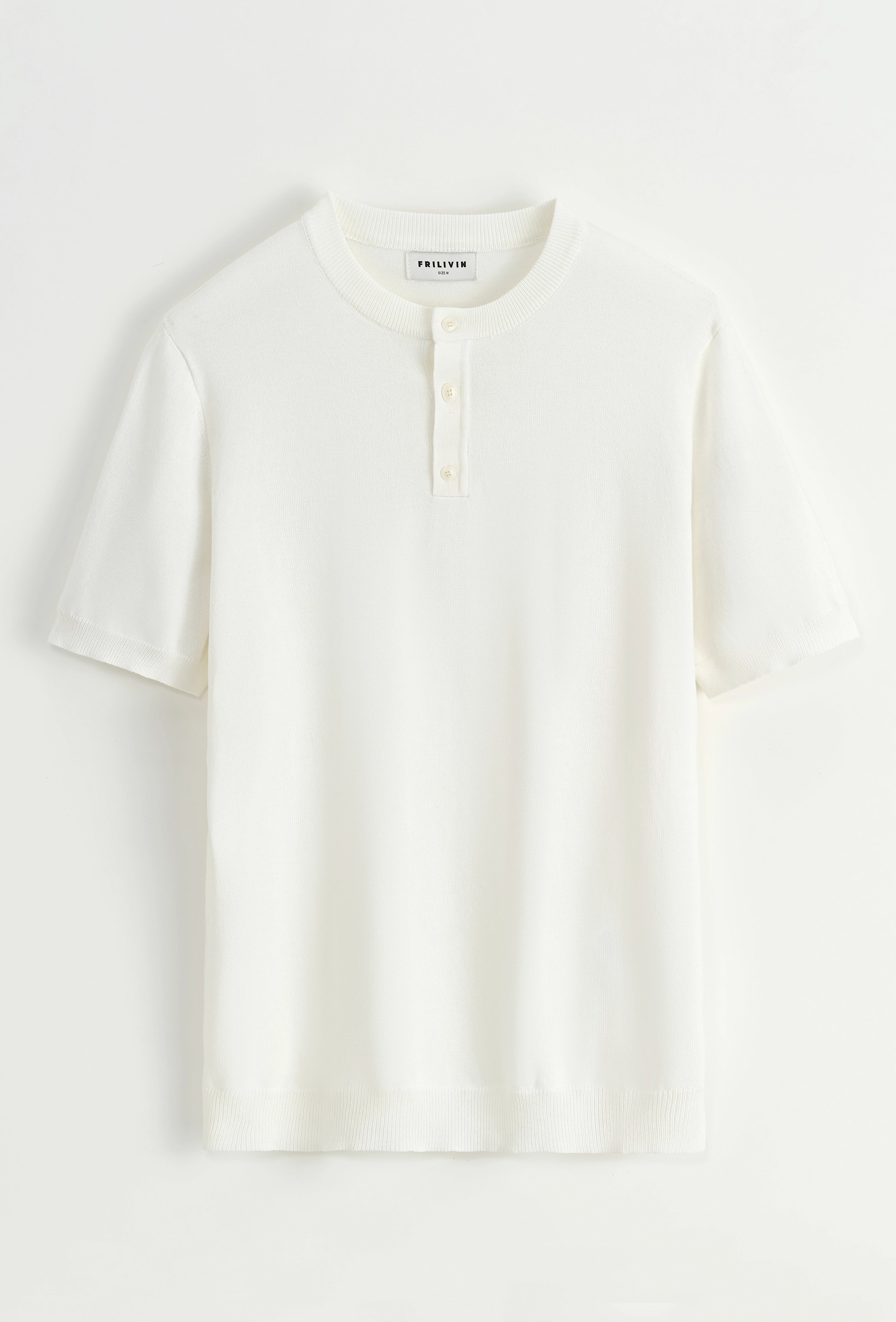 Polo uni à boutons manches courtes