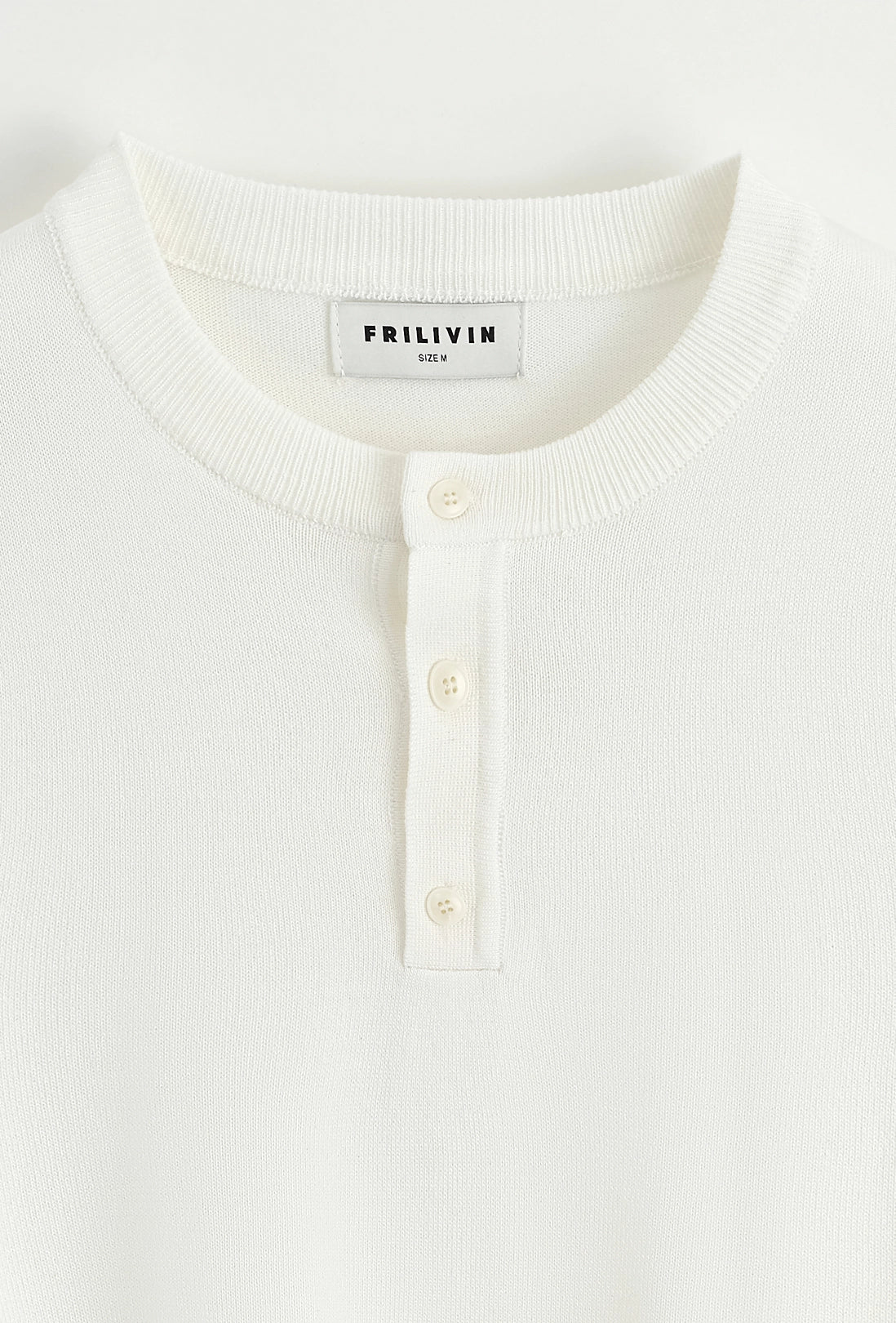 Polo uni à boutons manches courtes