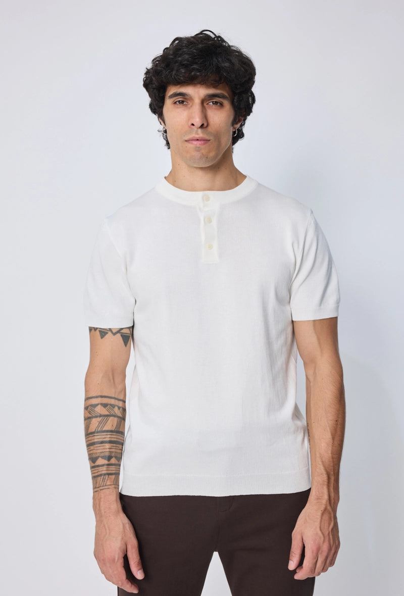 Polo uni à boutons manches courtes