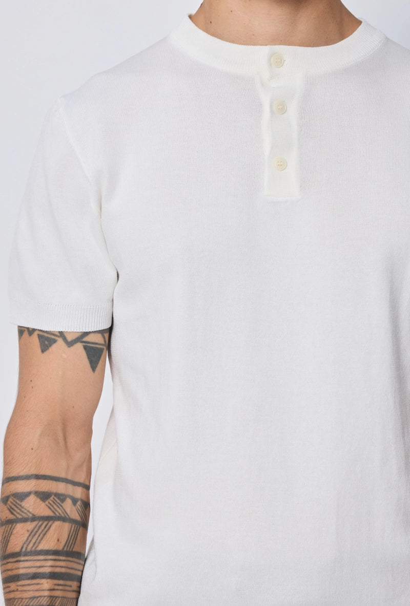 Polo uni à boutons manches courtes