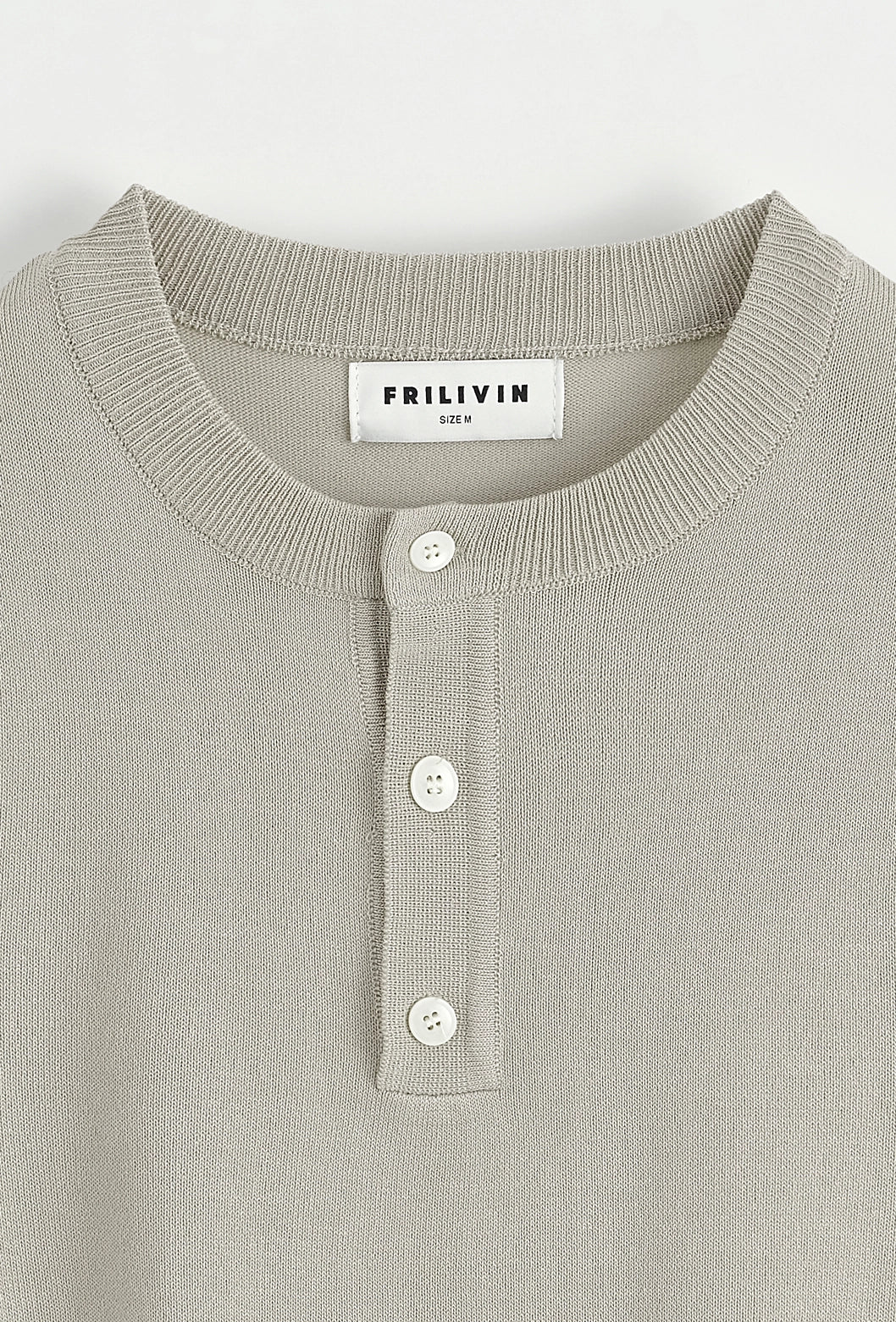 Polo uni à boutons manches courtes