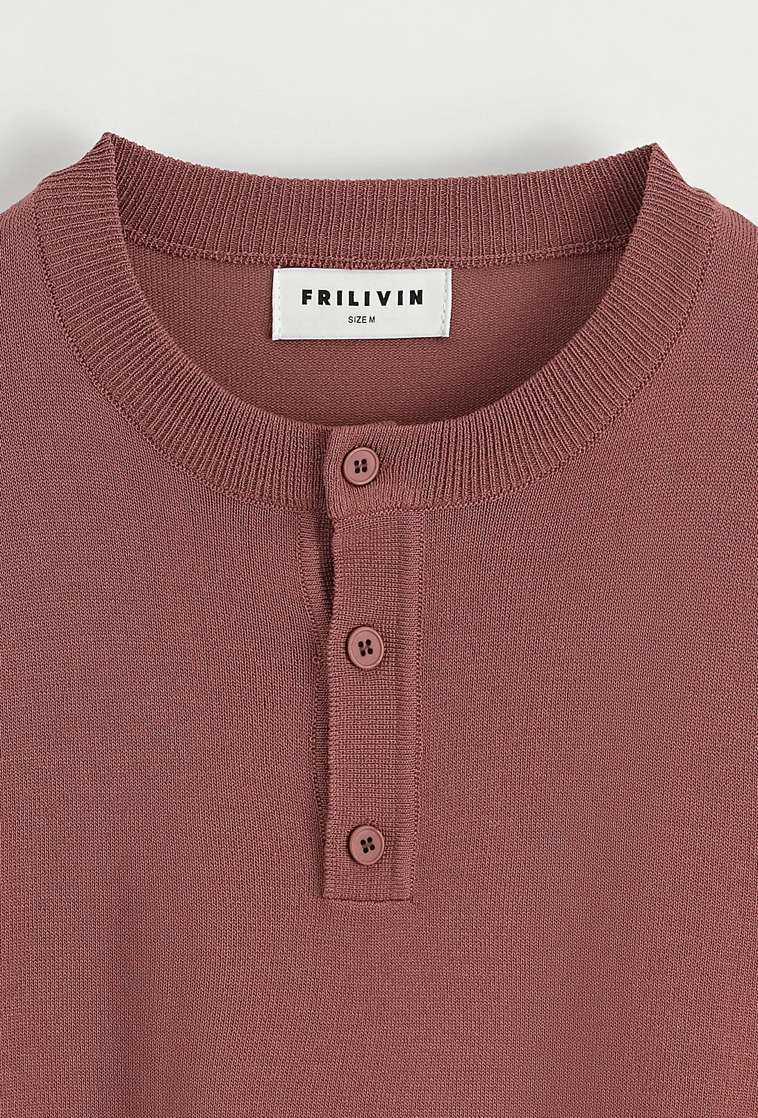 Polo uni à boutons manches courtes