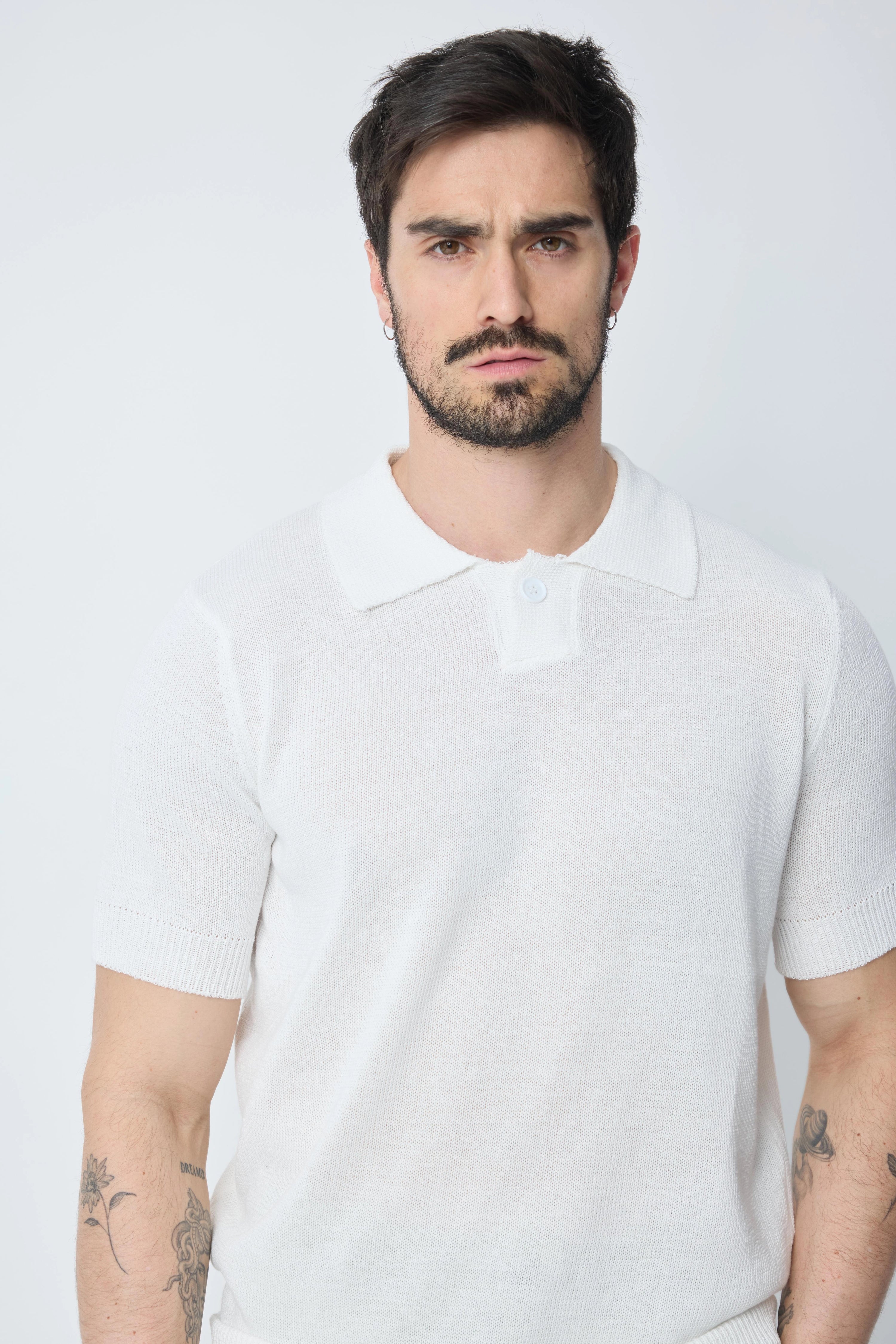 Polo uni manches courtes