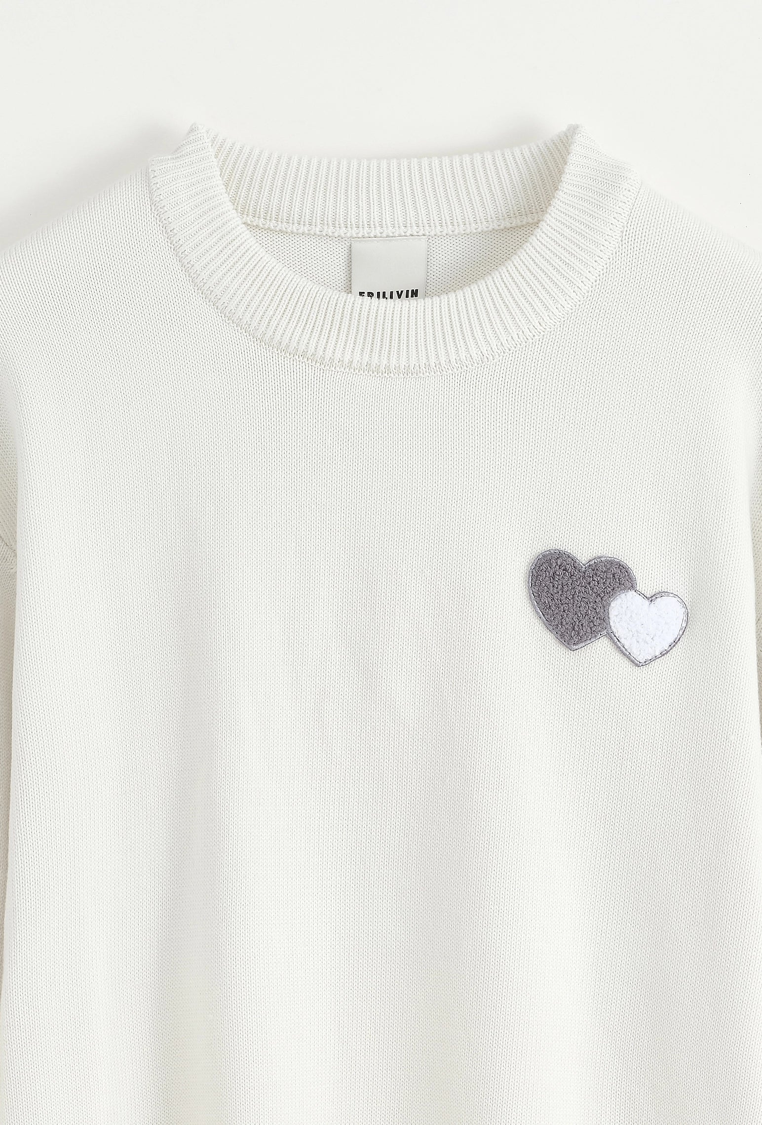 Pull à motif double cœur