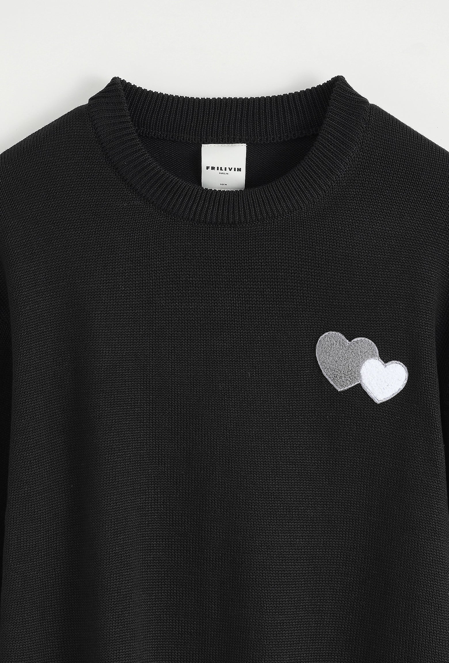 Pull à motif double cœur