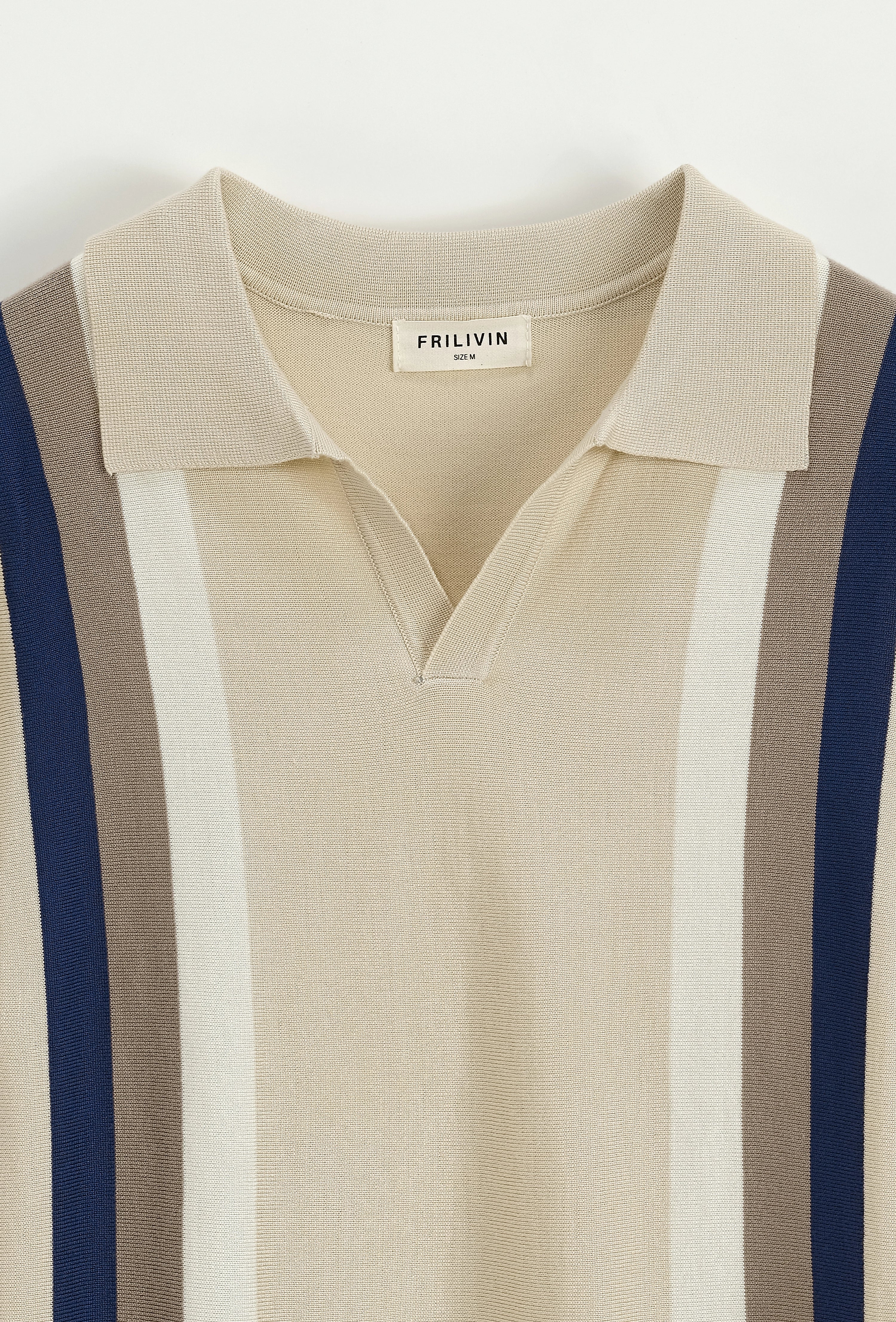 Polo à rayures latérales