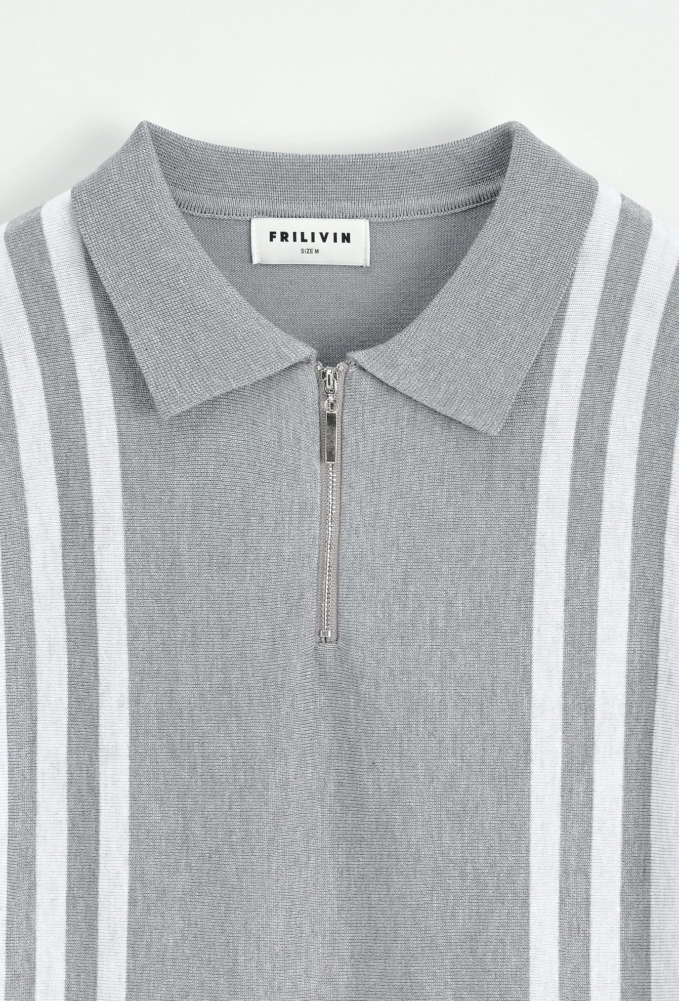 Polo avec détail à rayure