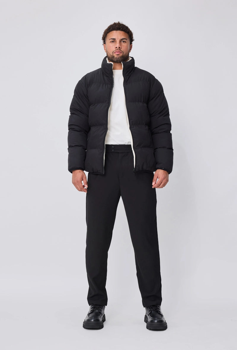 Manteau réversible bimatière