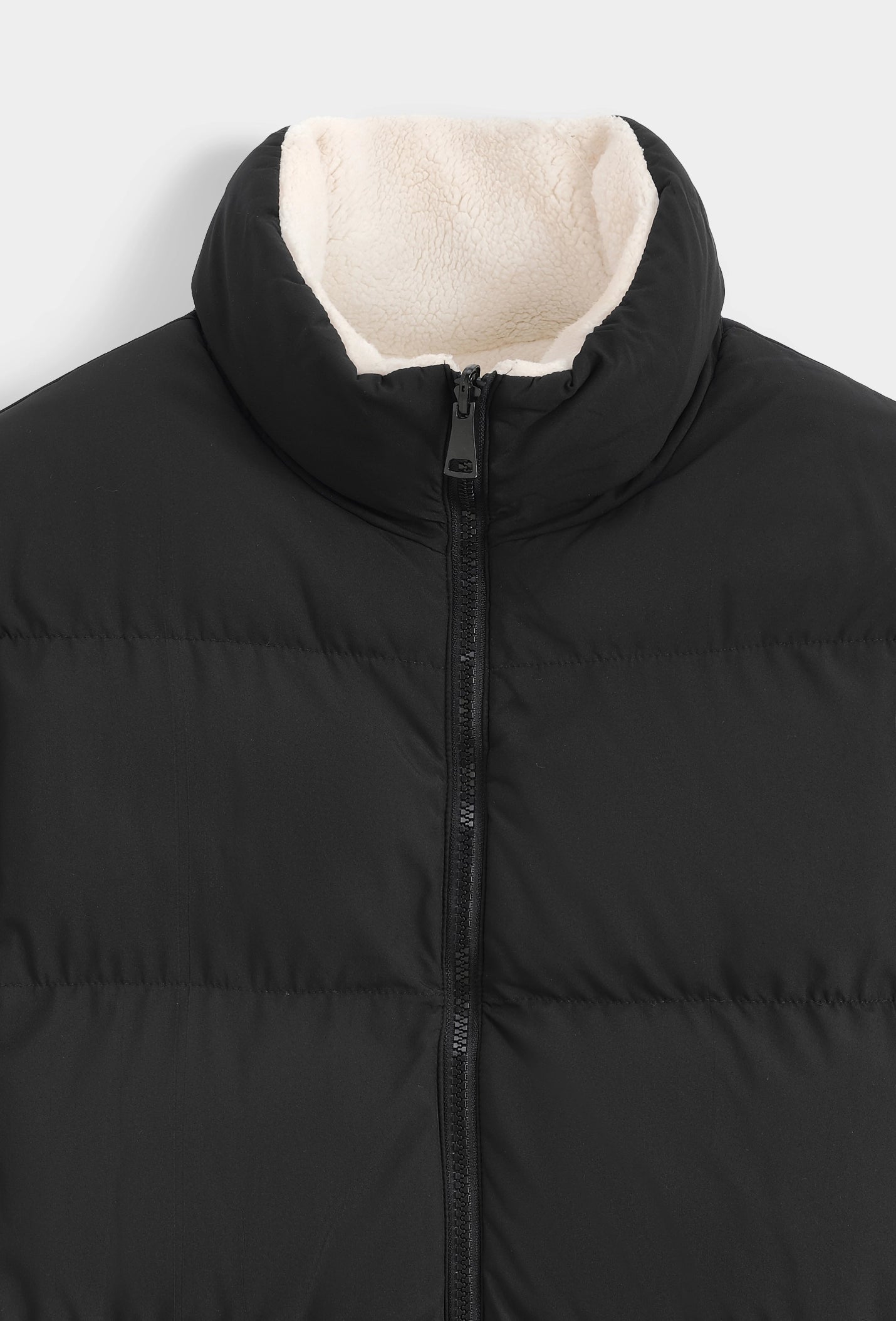 Manteau réversible bimatière
