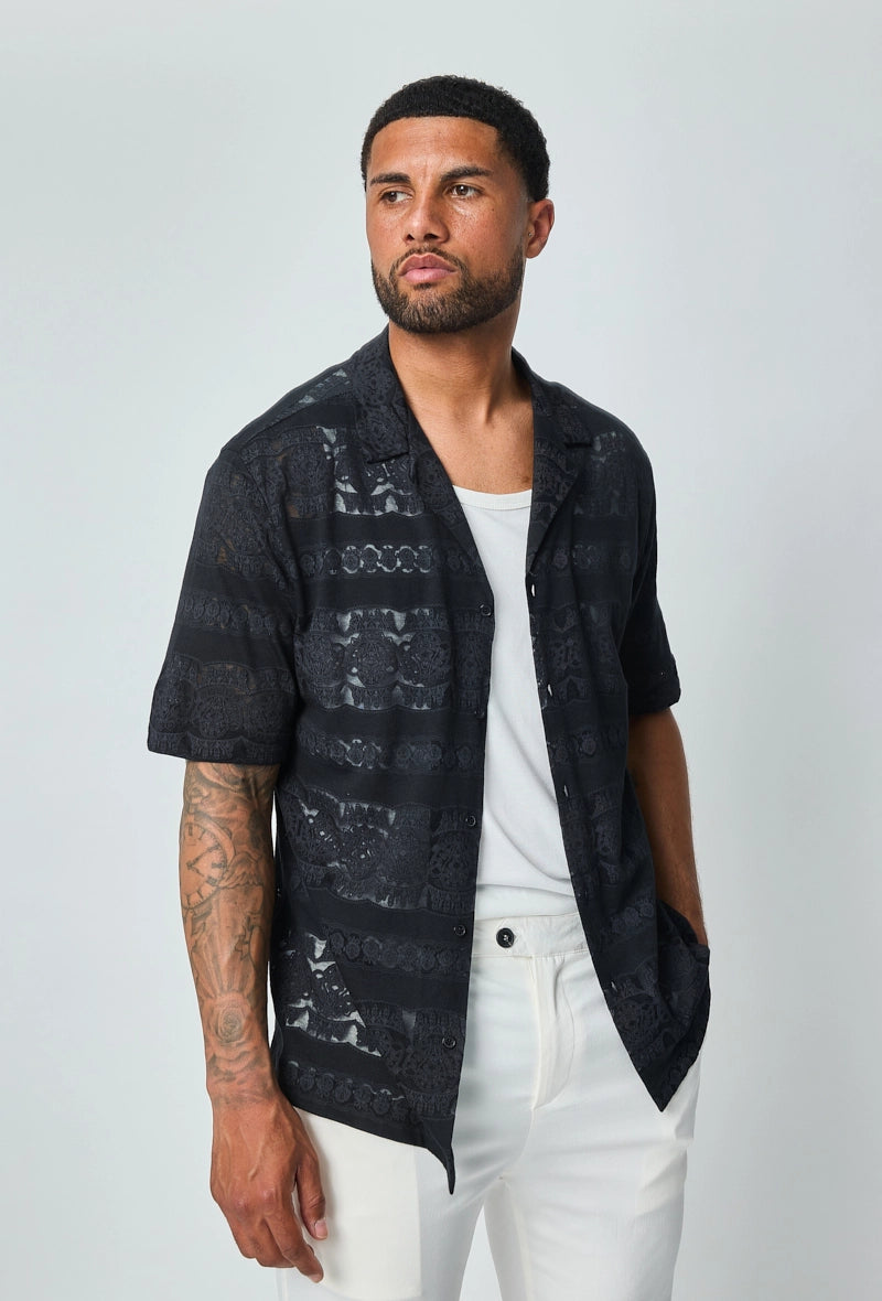 Chemise unie manches courtes à motifs