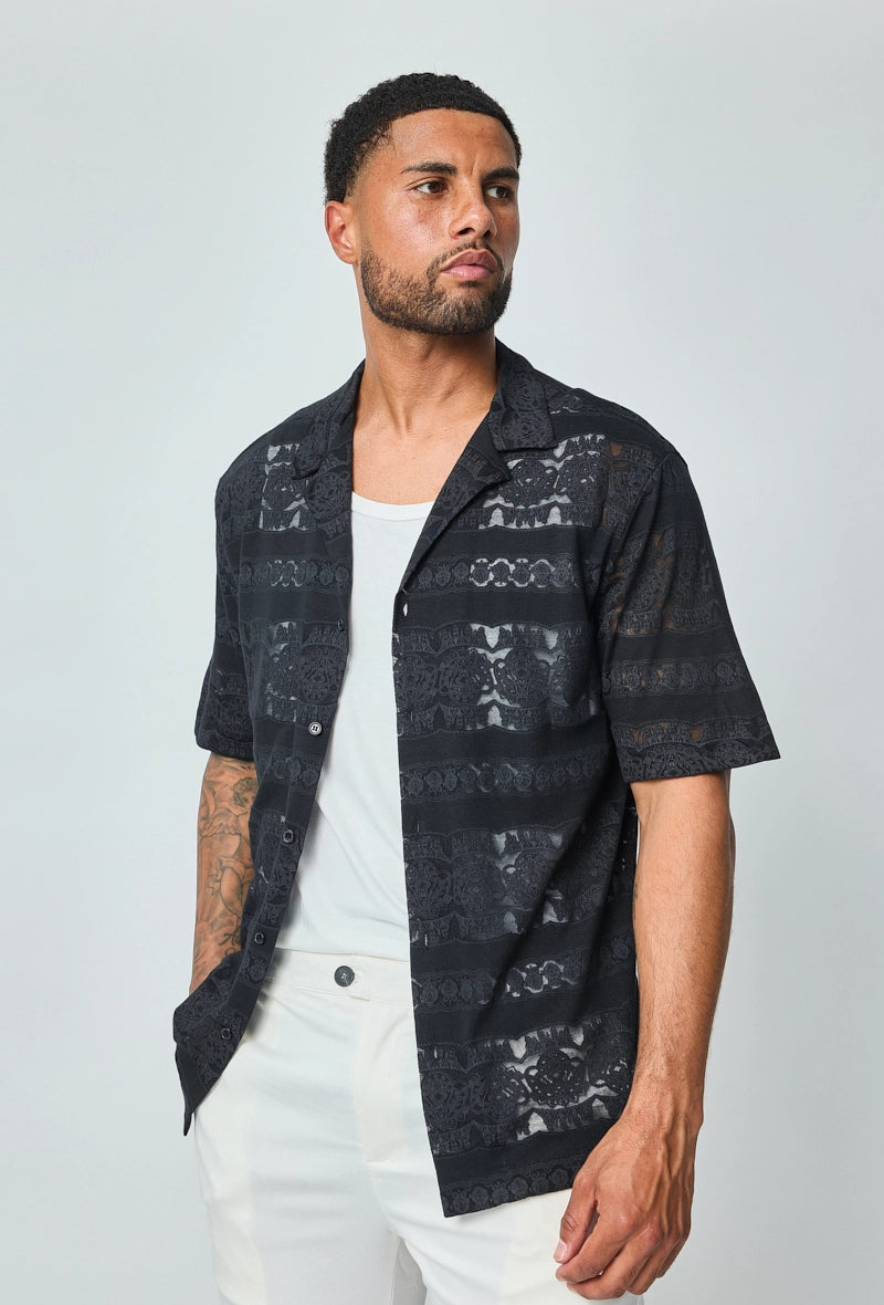 Chemise unie manches courtes à motifs