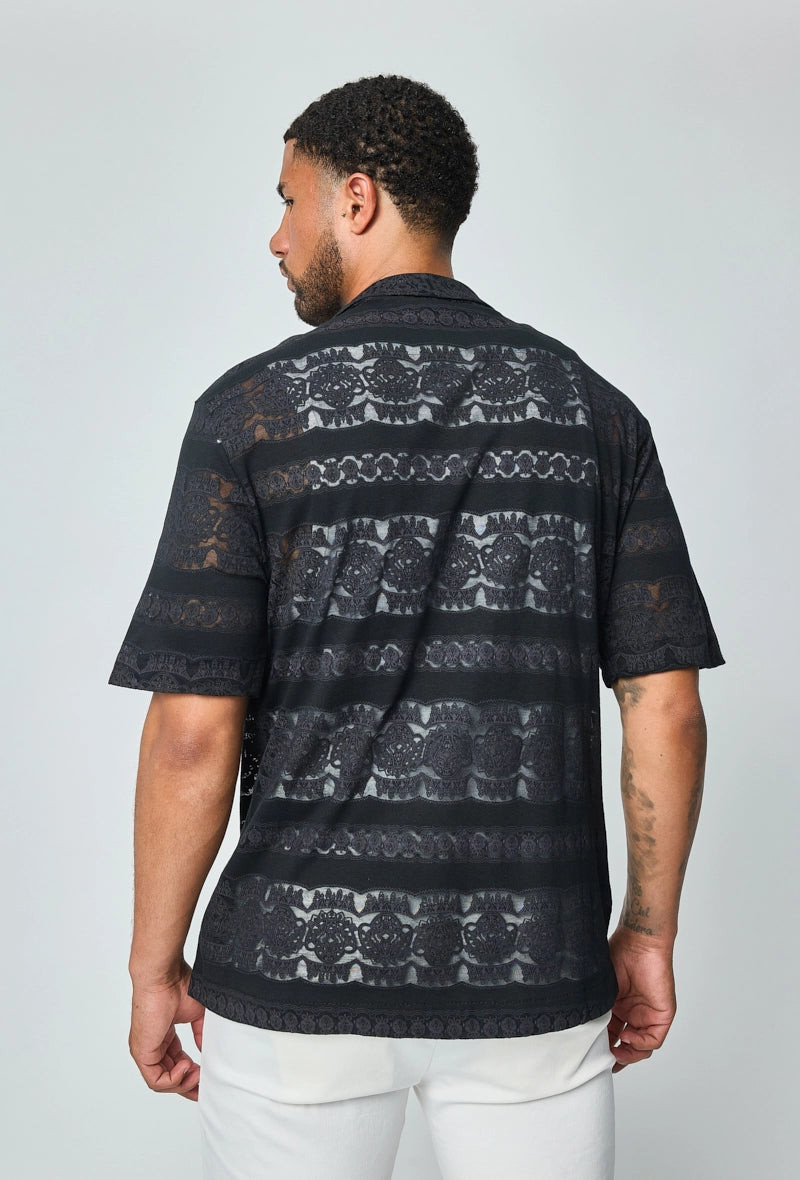 Chemise unie manches courtes à motifs