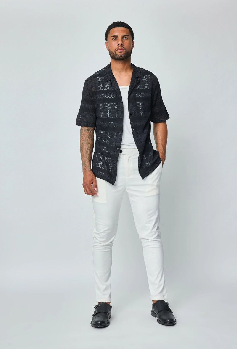 Chemise unie manches courtes à motifs