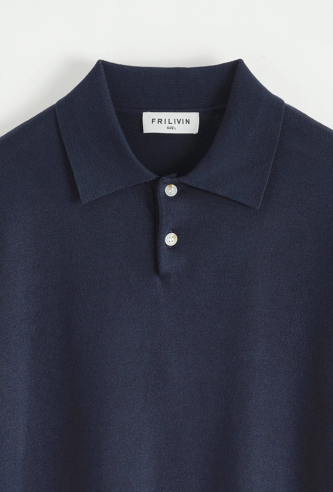 Polo boutonné manches courtes uni en maille