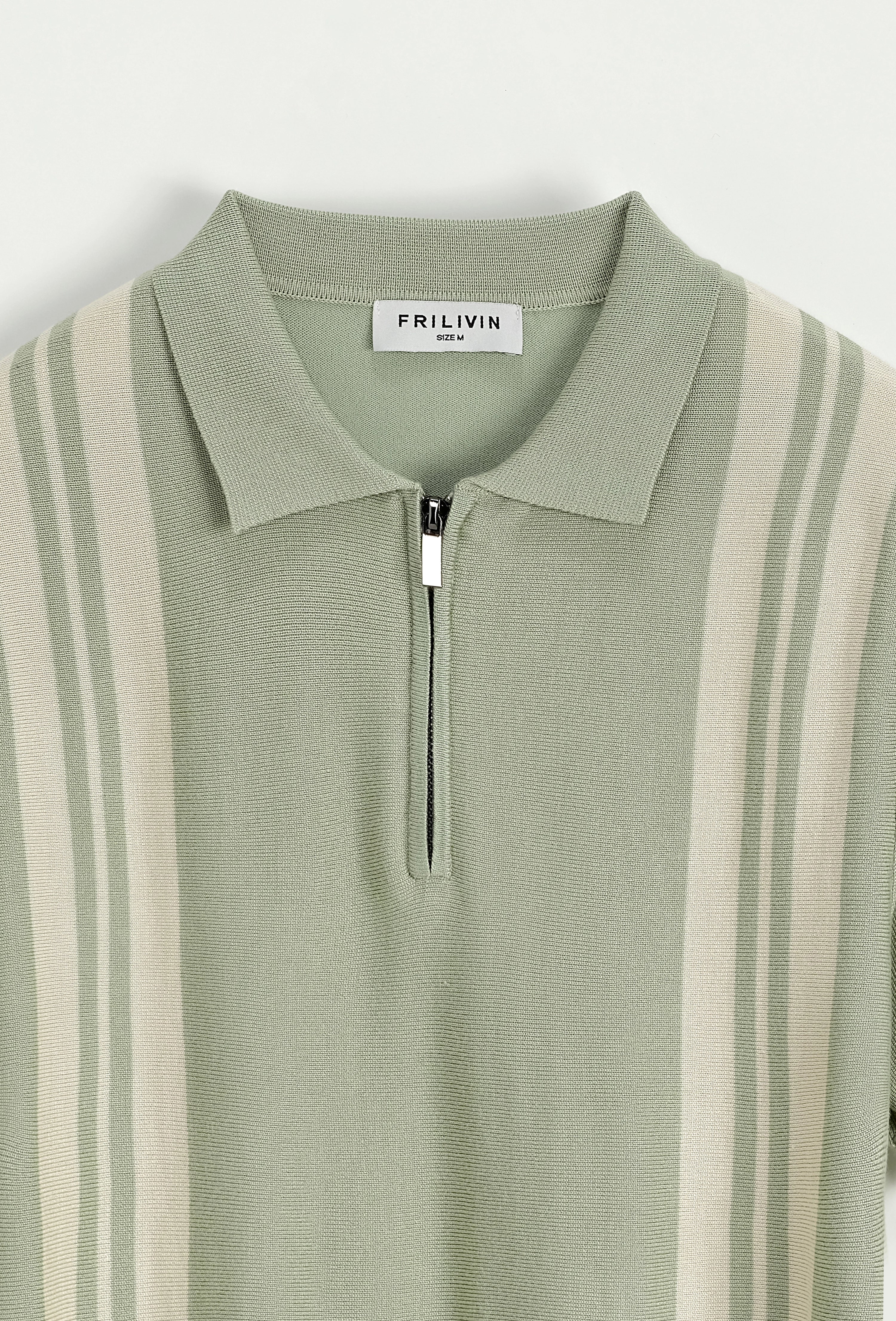 Polo à rayures latérales