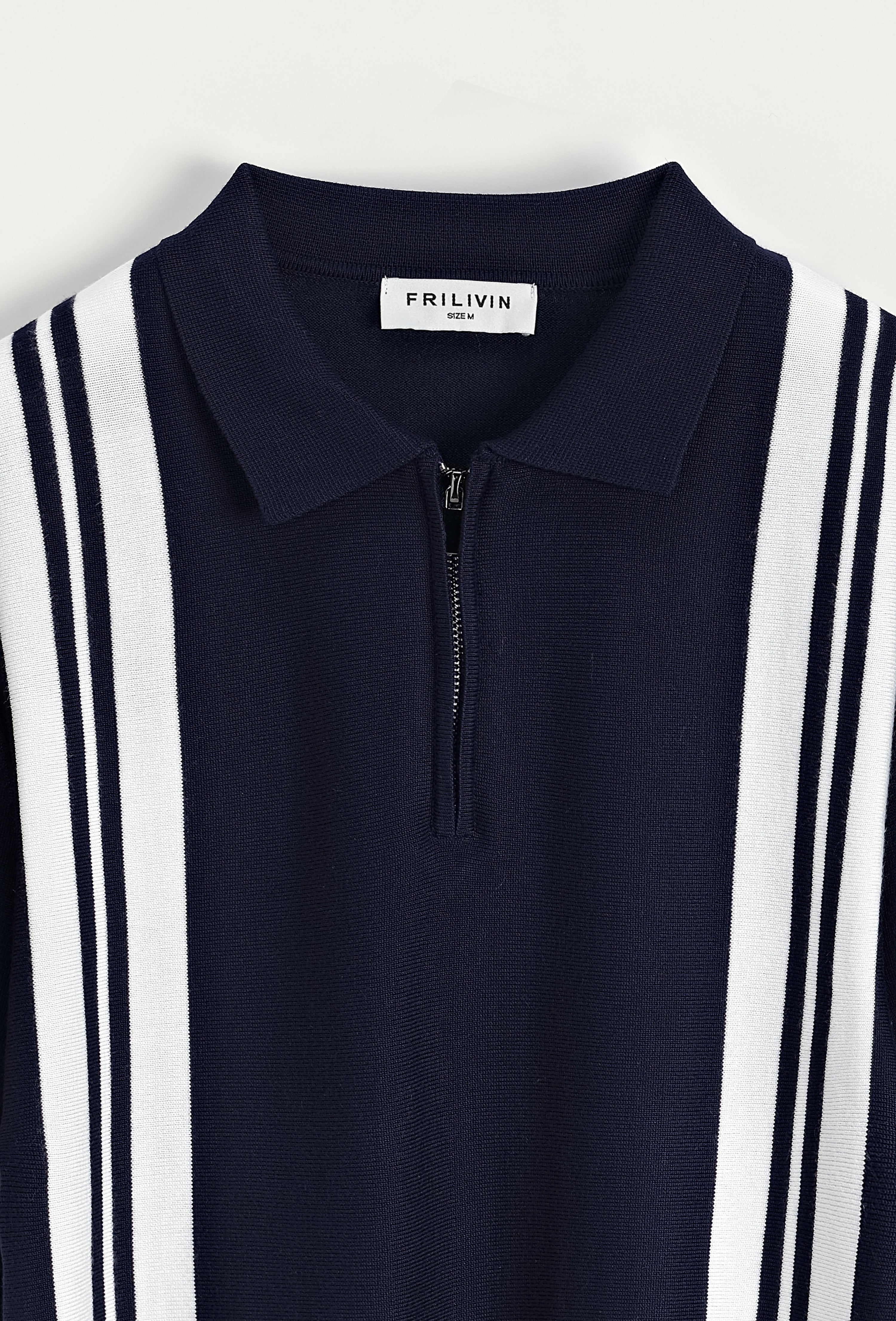 Polo à rayures latérales