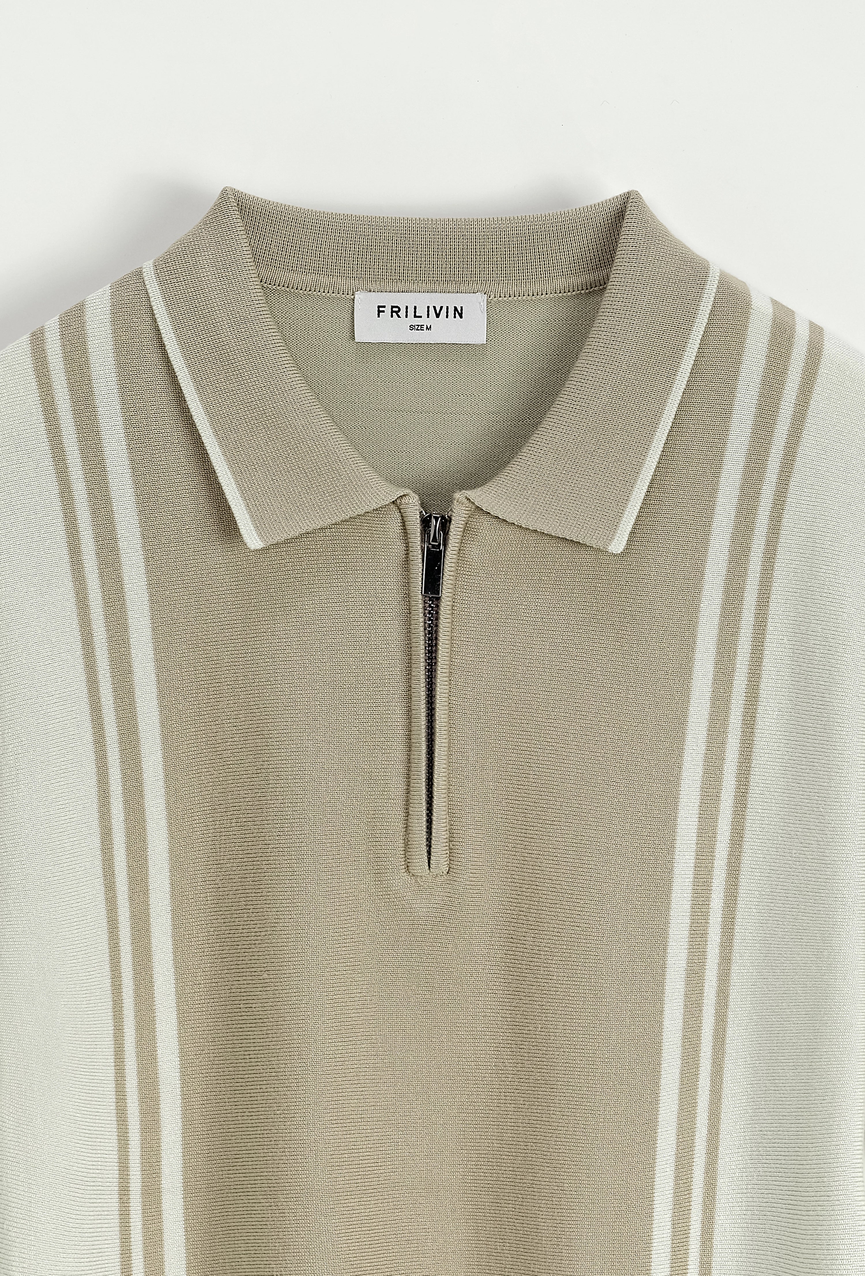 Polo à rayures latérales
