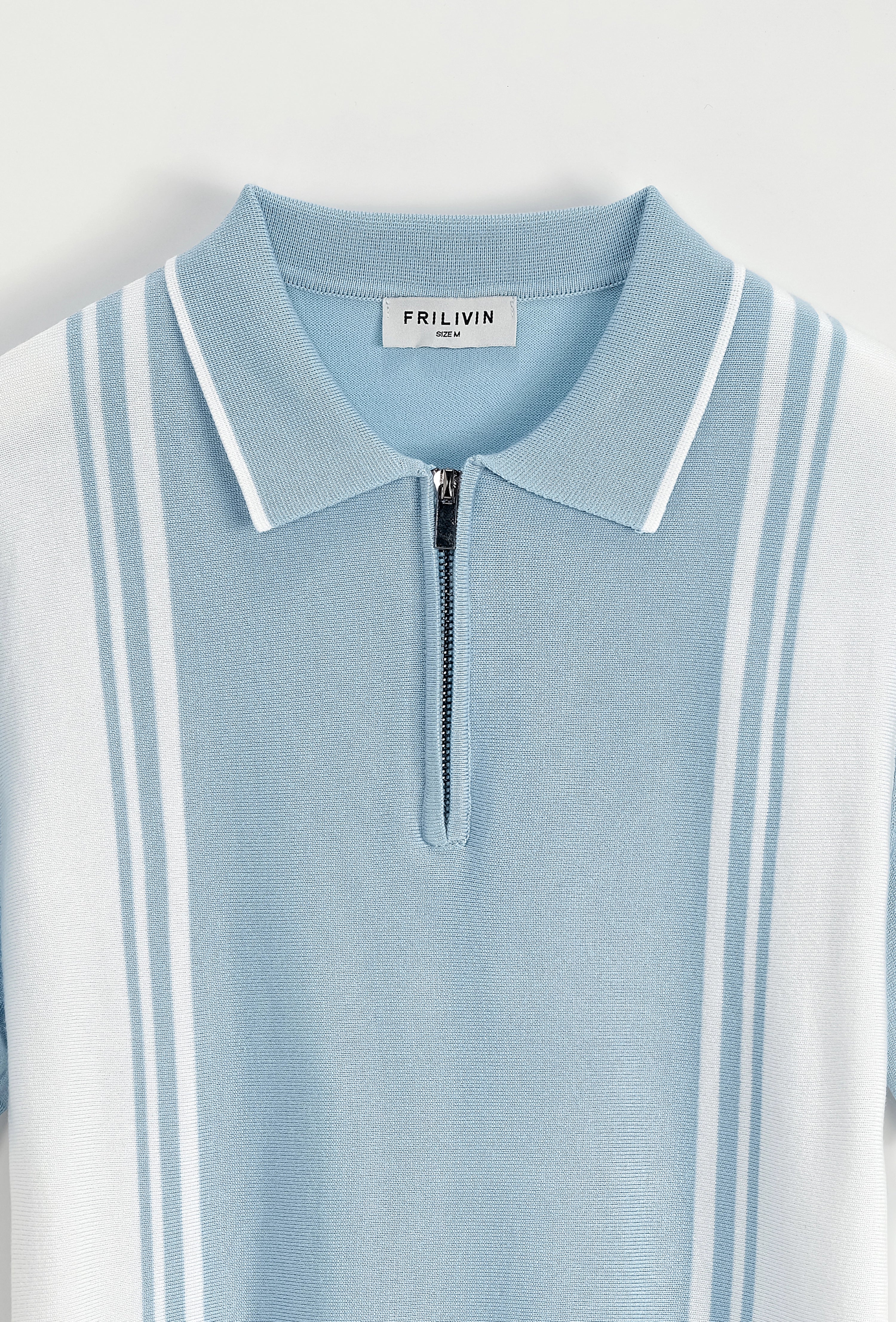 Polo à rayures latérales