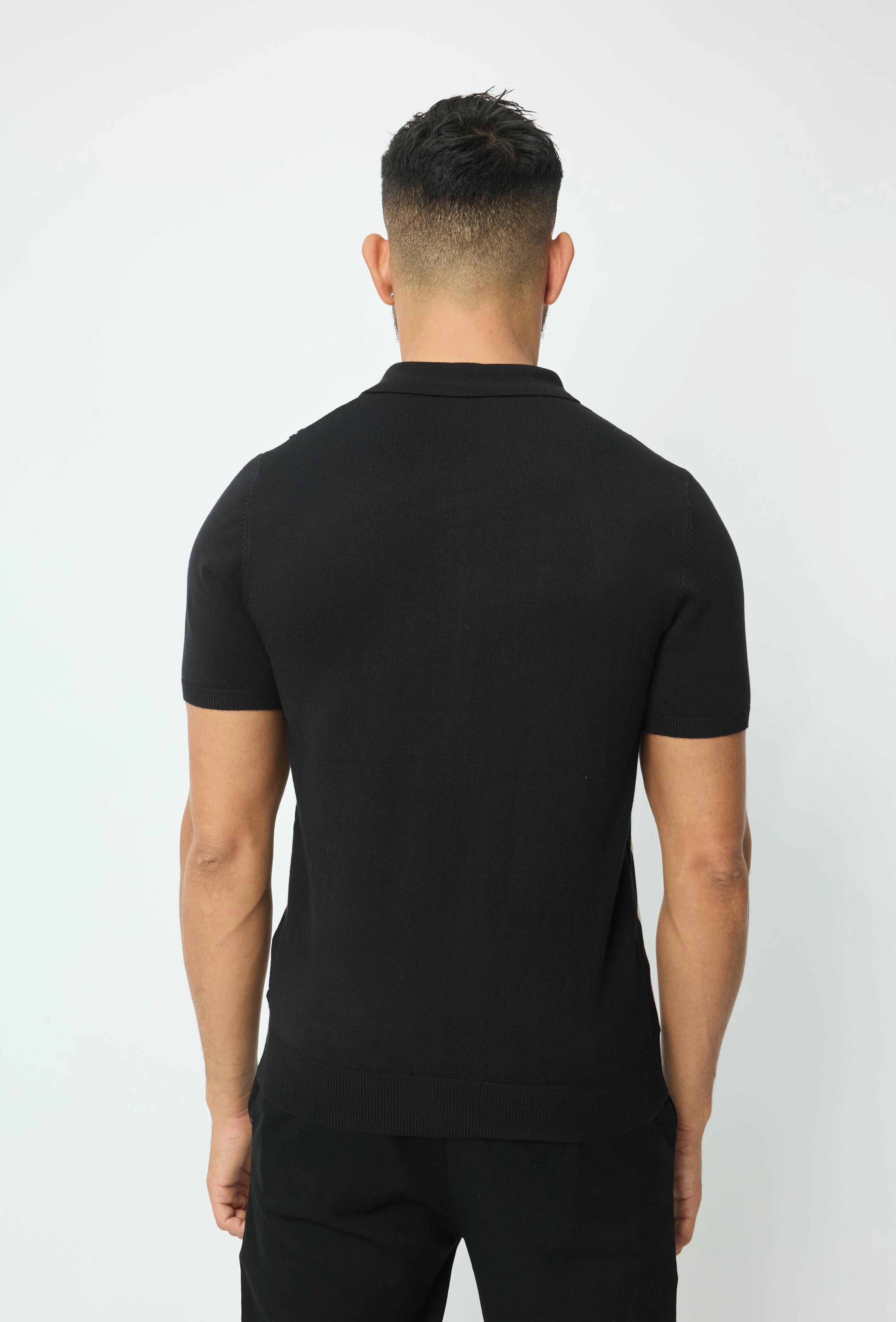 Polo manches courtes à zip en rayures