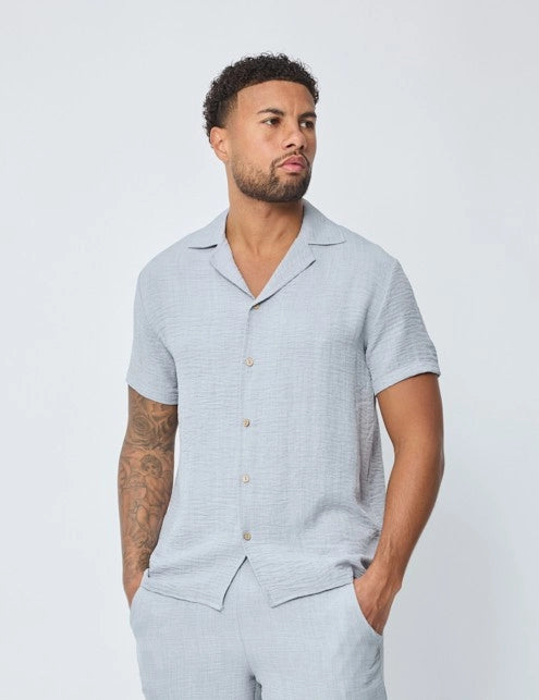 Chemise manches courtes à bouton