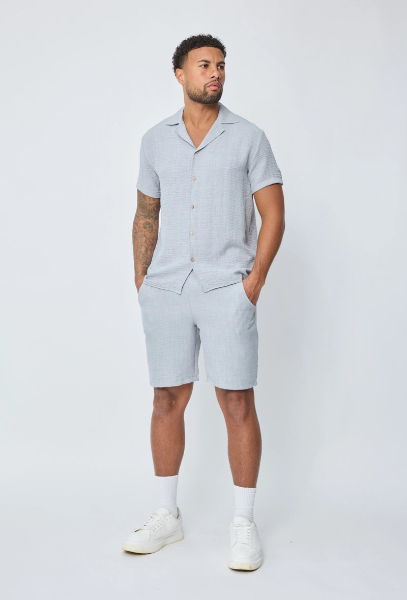 Chemise manches courtes à bouton