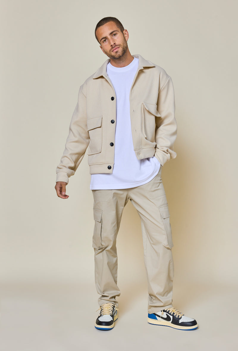 Plain textured jacket with large flap pockets