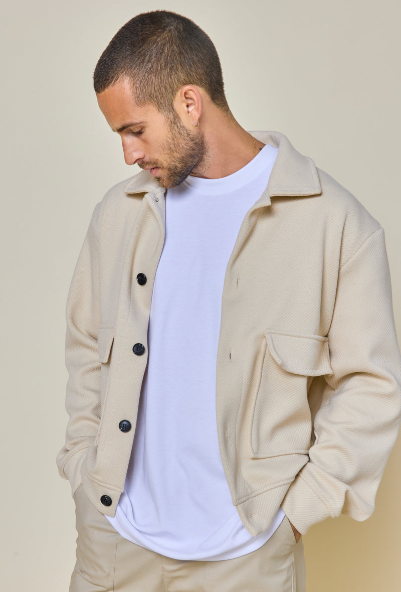 Plain textured jacket with large flap pockets
