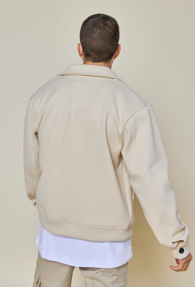 Plain textured jacket with large flap pockets